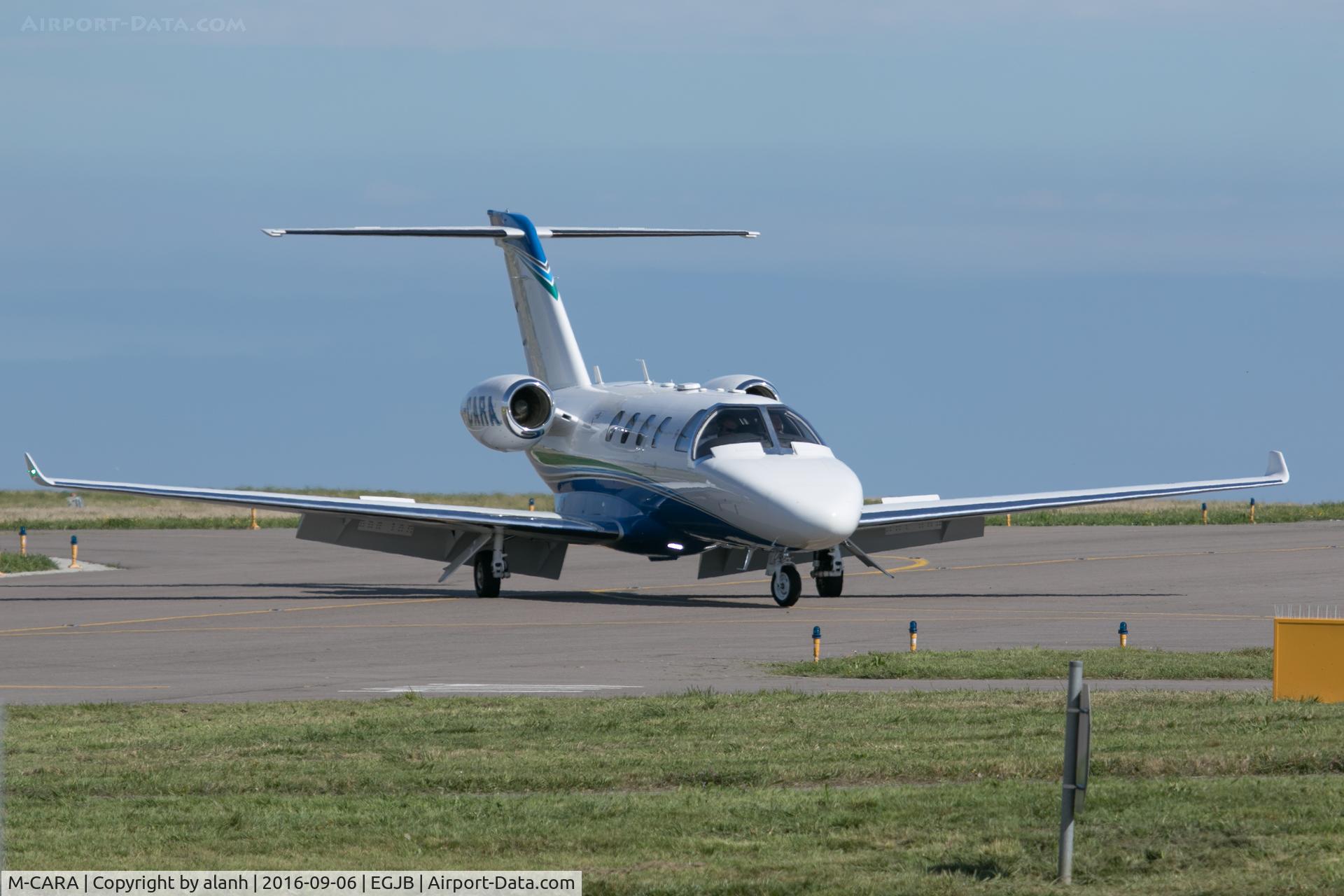 M-CARA, 2014 Cessna 525 Citation M2 C/N 525-0859, Taxying to ASG
