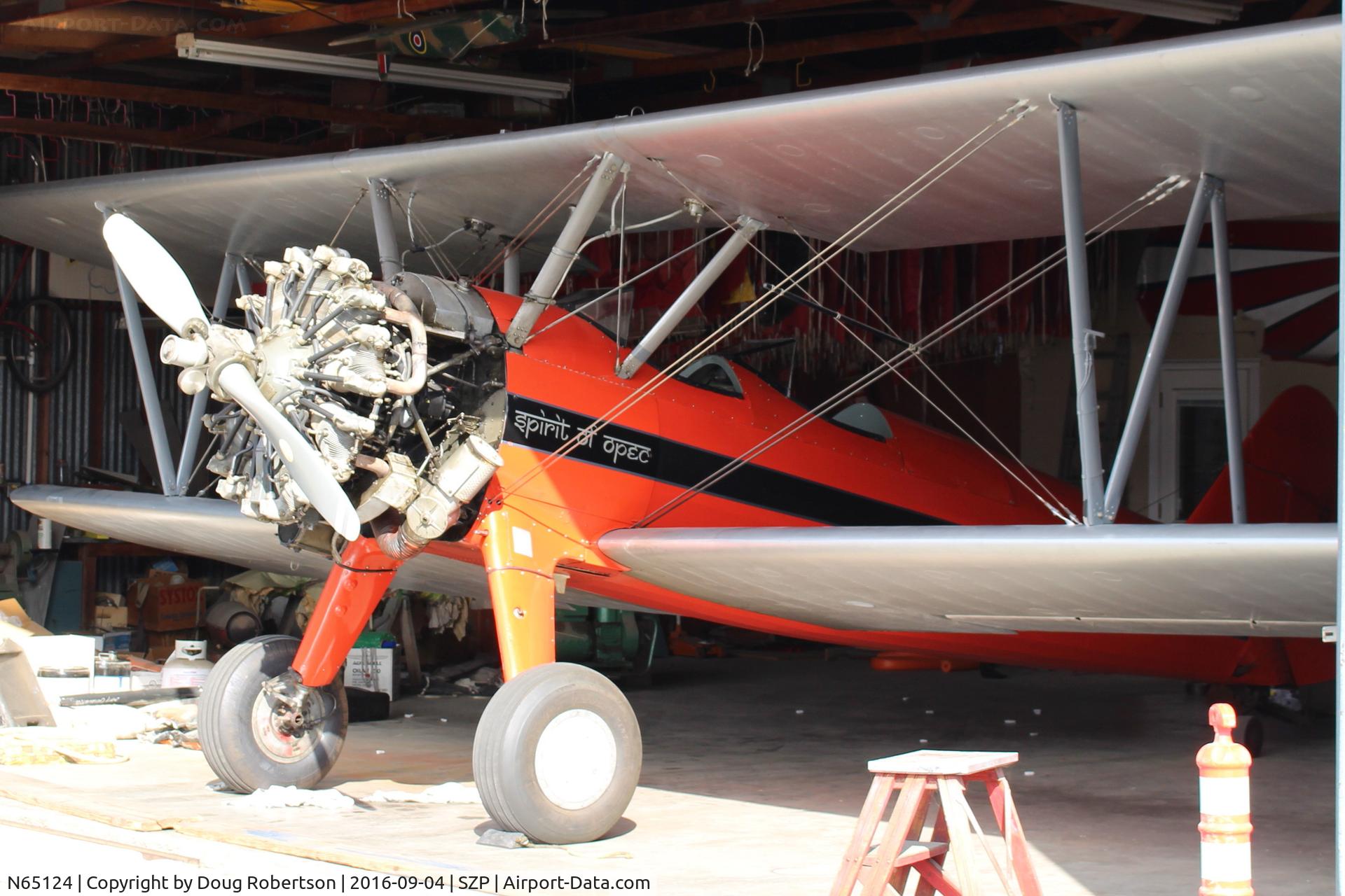 N65124, 1943 Boeing A75N1(PT17) C/N 75-1260, 1943 Boeing Stearman A75N1 (PT-17) 'Spirit of OPEC', P&W R-985 450 Hp Wasp Jr. upgrade build by Jacobs, squared wingtips mod gives more wing area, in a Mason hangar. Experimental class. Read my Stearman article here, more photos.
