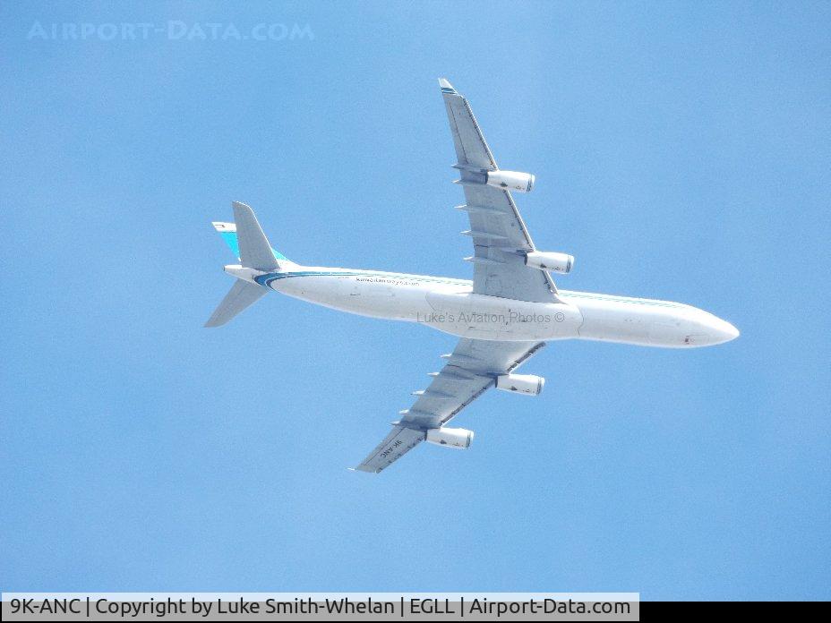 9K-ANC, 1995 Airbus A340-313 C/N 101, Flying over Surrey whilst on approach to Heathrow.