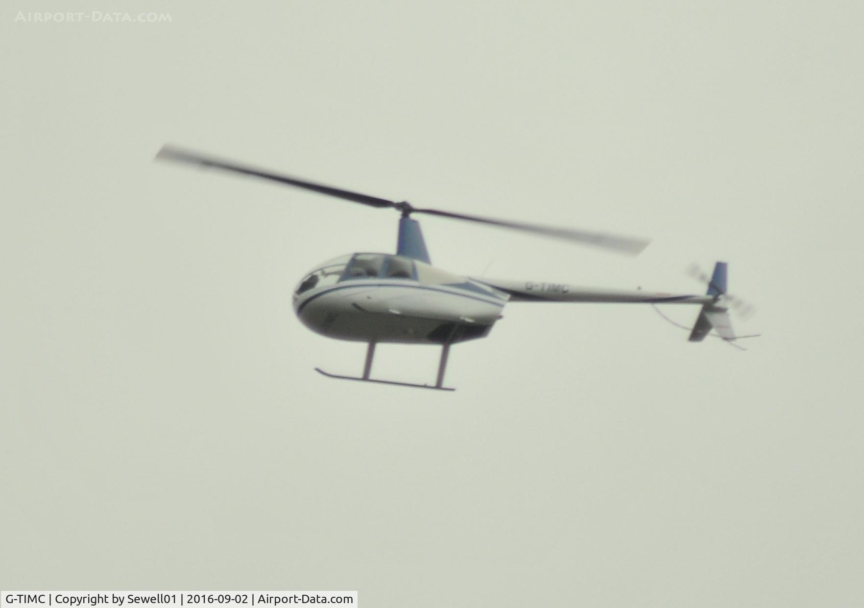 G-TIMC, 2006 Robinson R44 Raven II C/N 11102, Overhead