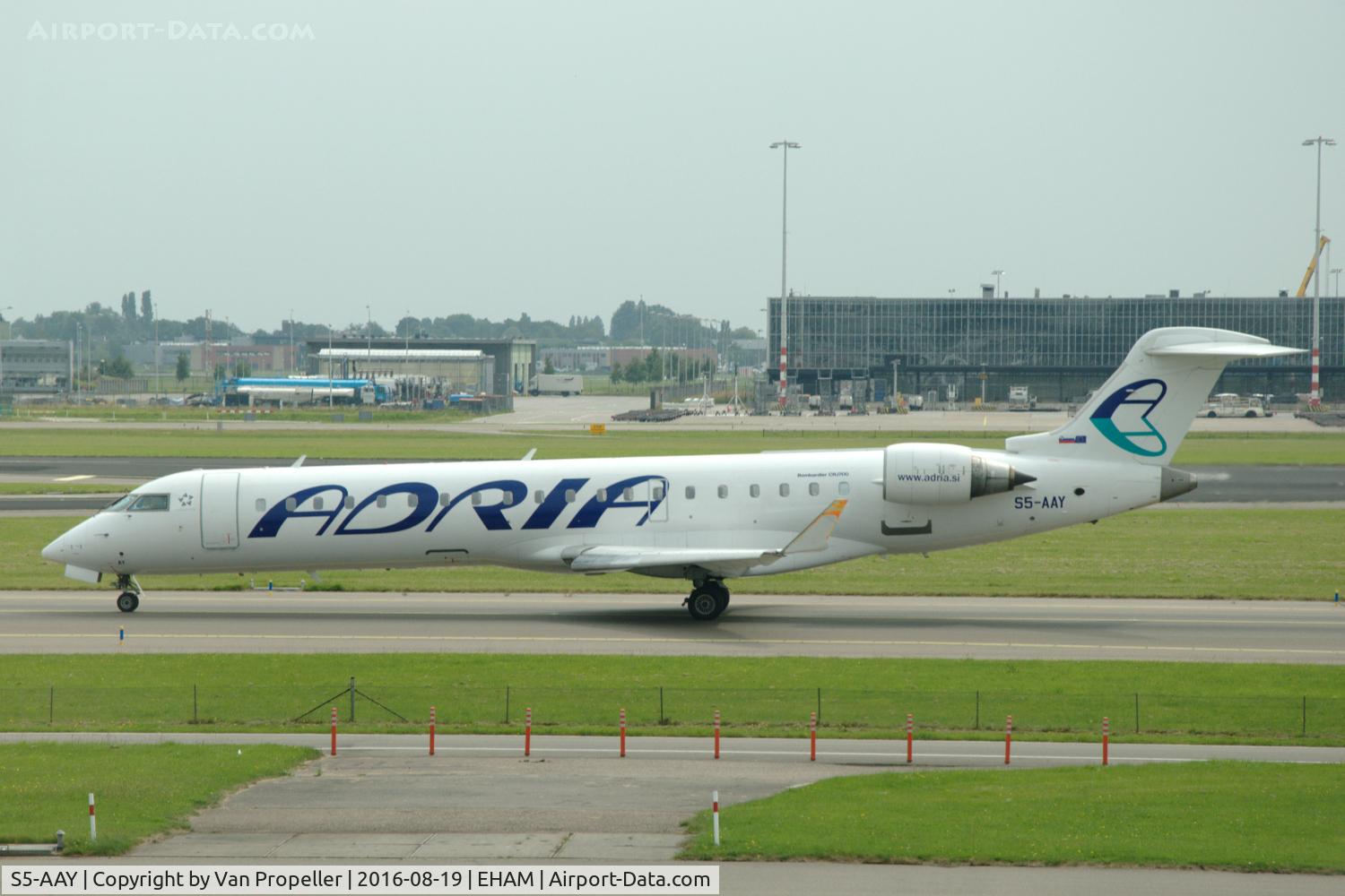 S5-AAY, 2003 Bombardier CRJ-701ER (CL-600-2C10) Regional Jet C/N 10080, Bombardier CRJ-701ER of Adria Airways at Schiphol airport, the Netherlands