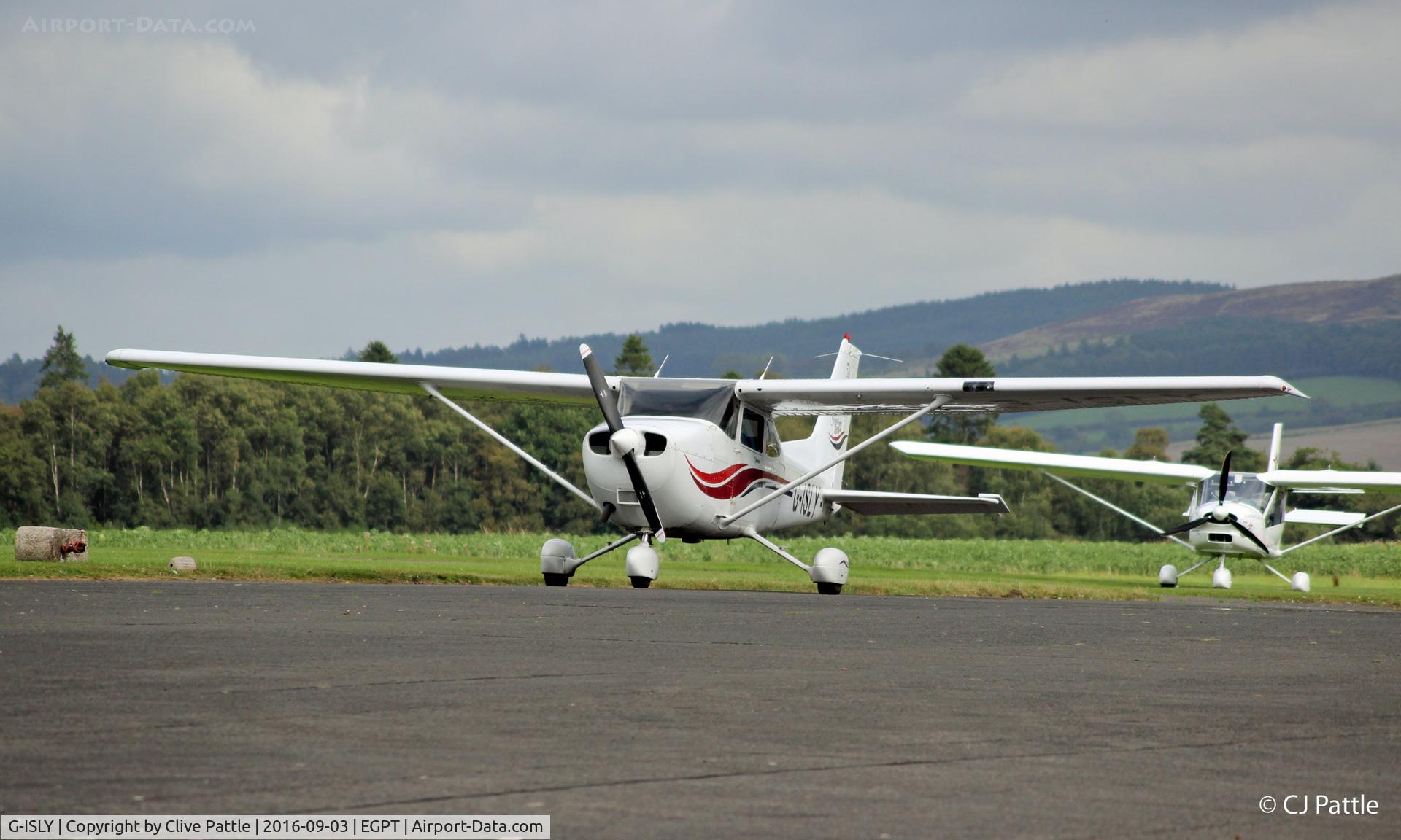 G-ISLY, 1999 Cessna 172S C/N 172S-8152, On the apron at Perth EGPT