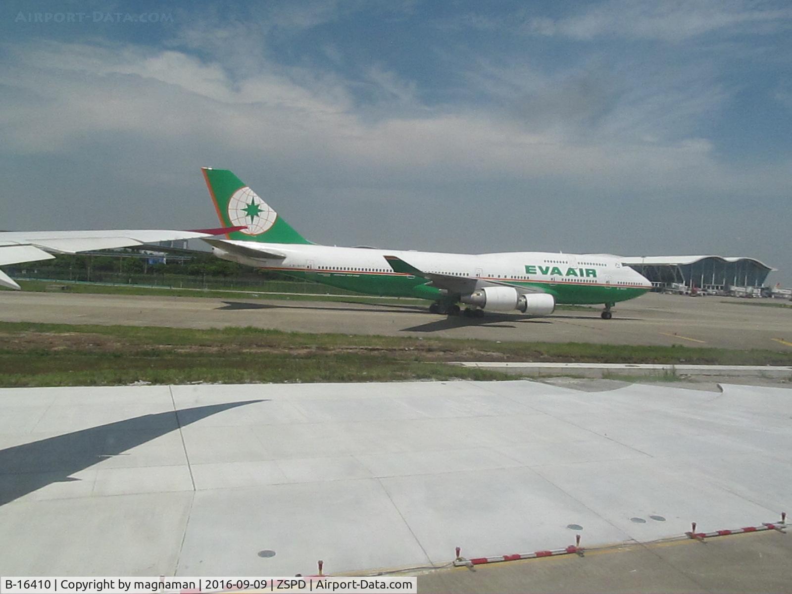 B-16410, 1997 Boeing 747-45E C/N 29061, taxying out as we leave too