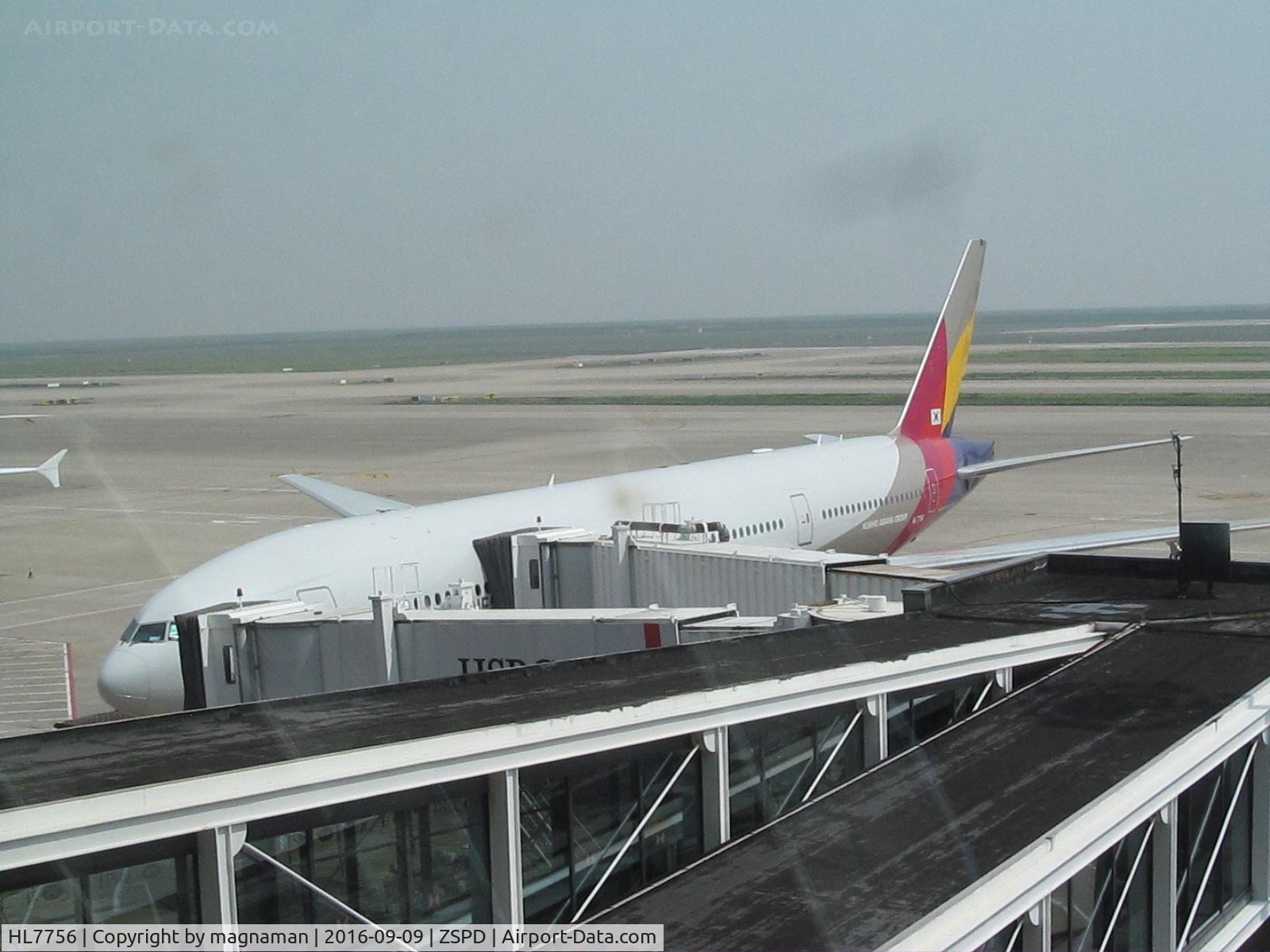 HL7756, Boeing 777-28E/ER C/N 30860/659, on stand at PVG