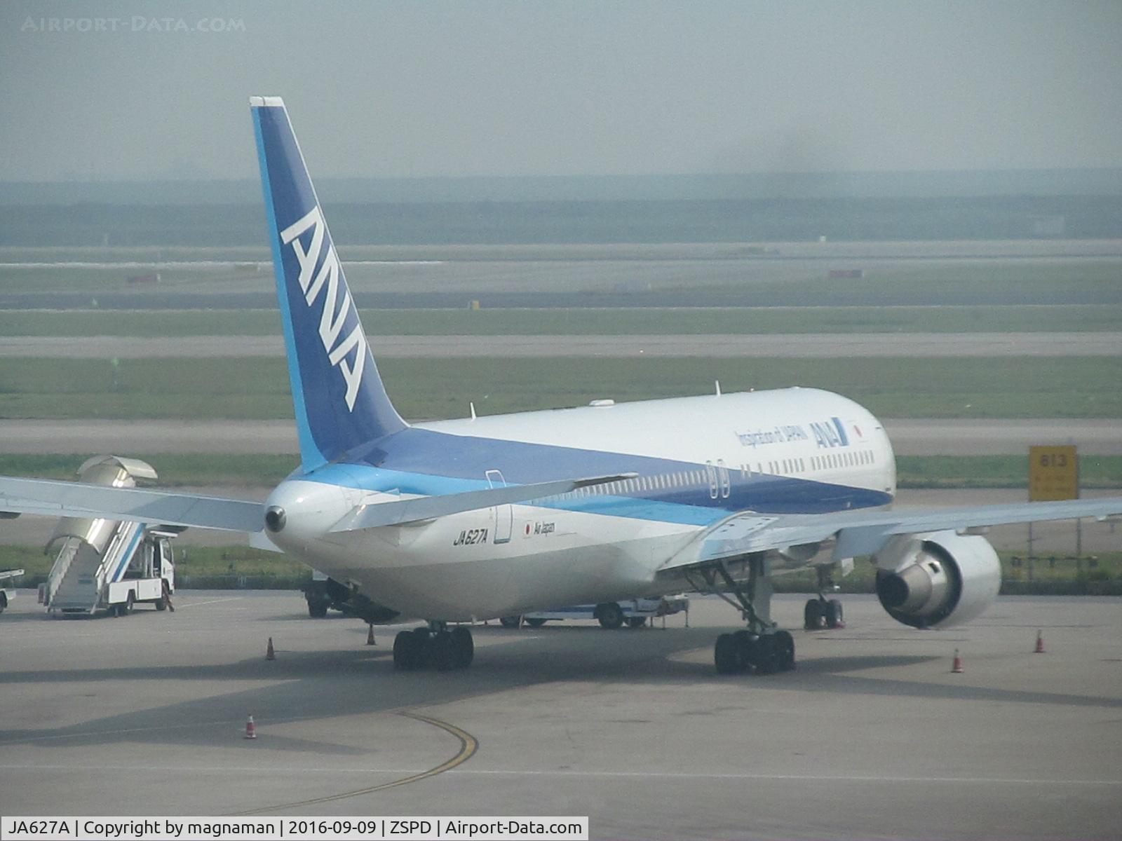 JA627A, 2012 Boeing 767-381/ER C/N 40898, on remote stand