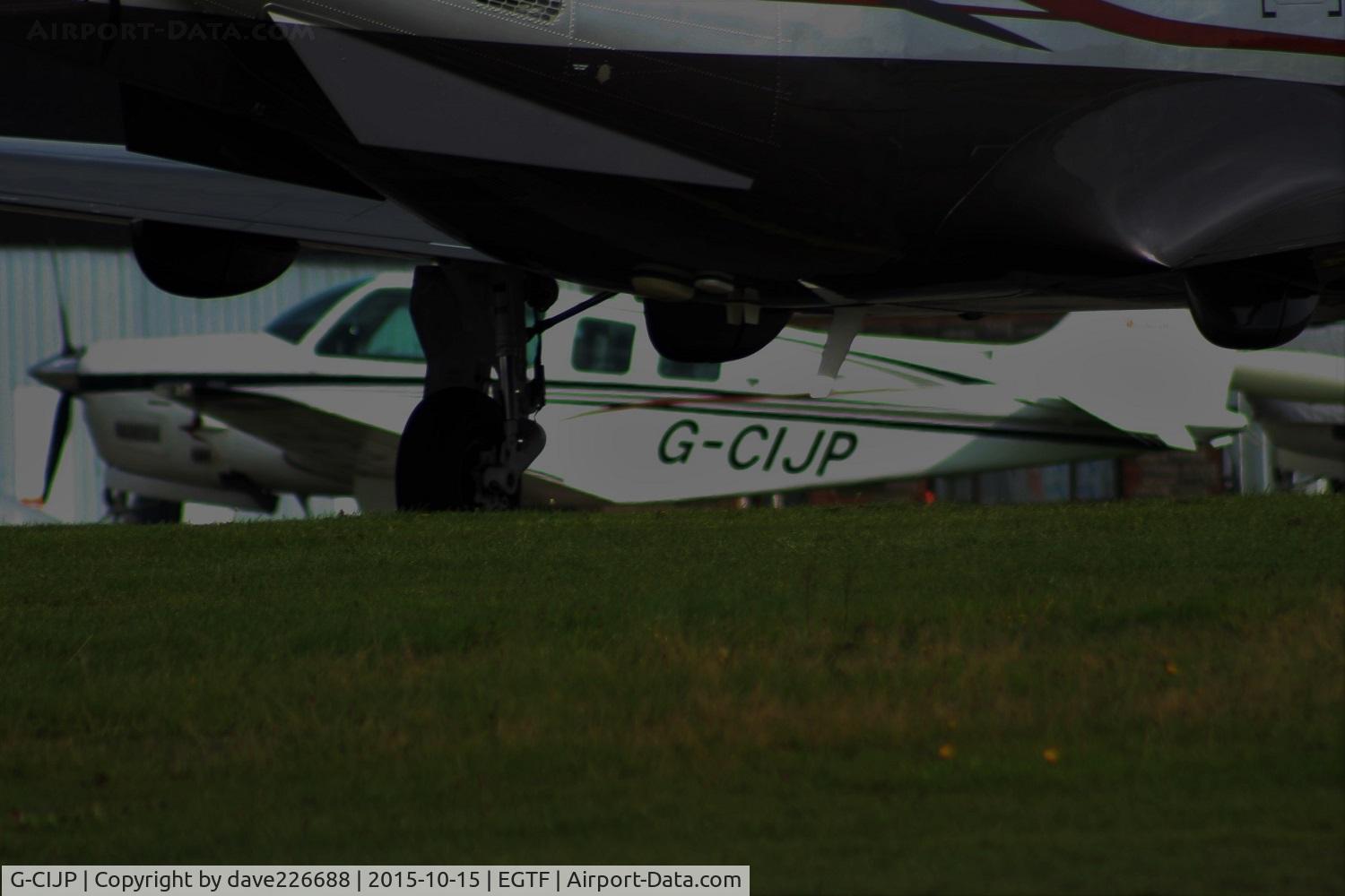 G-CIJP, 1989 Beech B36TC Bonanza C/N EA-492, G-CIJP Beech B36TC hiding behind M-AMAN at Fairoaks EGTF, sorry about picture quality !!