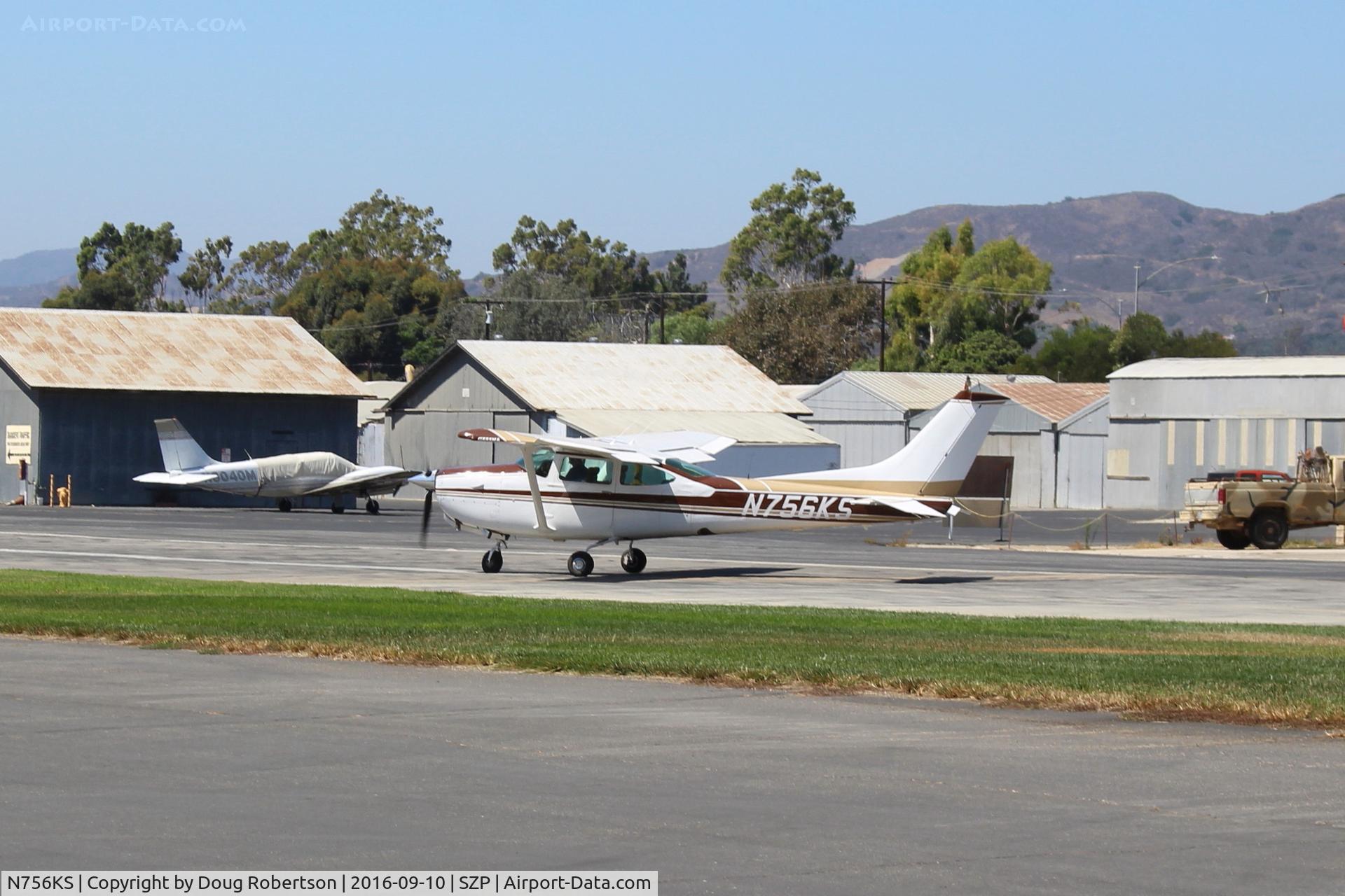 N756KS, 1979 Cessna TR182 Turbo Skylane RG C/N R18201096, 1979 Cessna TR182 SKYLANE RG II, Lycoming O-540-L3C5D 225 Hp. AiResearch turbocharger delivers full rated engine power up to this aircraft's 20,000' ceiling. Takeoff roll Rwy 22.