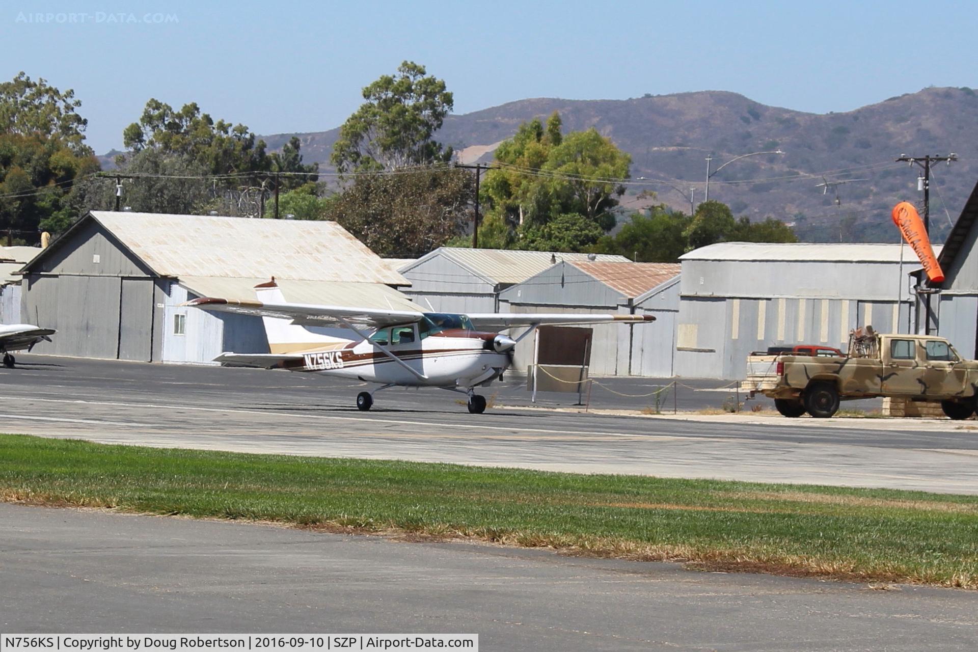N756KS, 1979 Cessna TR182 Turbo Skylane RG C/N R18201096, 1979 Cessna TR182 SKYLANE RG II, Lycoming O-540-L3C5D 225 Hp, AiResearch turbocharger delivers full rated engine power to this aircraft up to its 20,000' ceiling. Taking the active for a U-turn.
