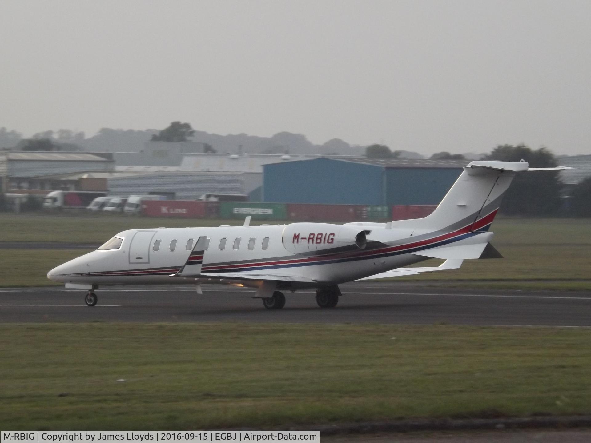 M-RBIG, 2005 Learjet 45 C/N 45-280, Takeing off runway 27 At Gloucestershire Airport.