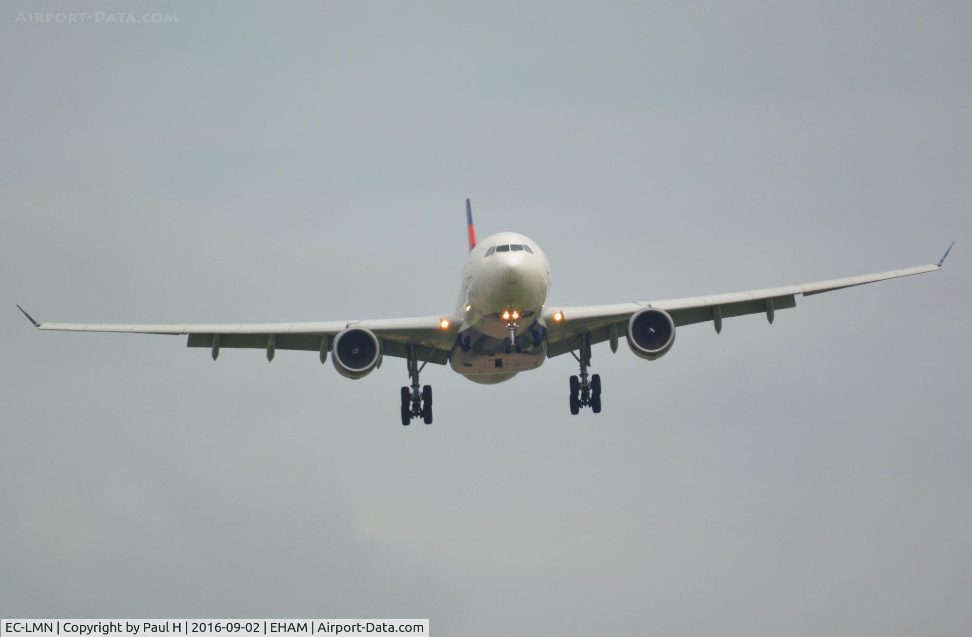 EC-LMN, 2004 Airbus A330-243 C/N 597, A330 seconds from touching down at the Polderbaan