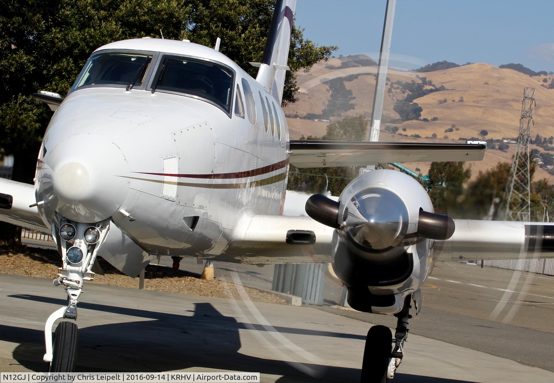 N12GJ, 1972 Beech E-90 King Air C/N LW-12, Locally-based 1972 King Air E90 taxing to the wash rack for me to wash at Reid Hillview Airport, San Jose, CA.