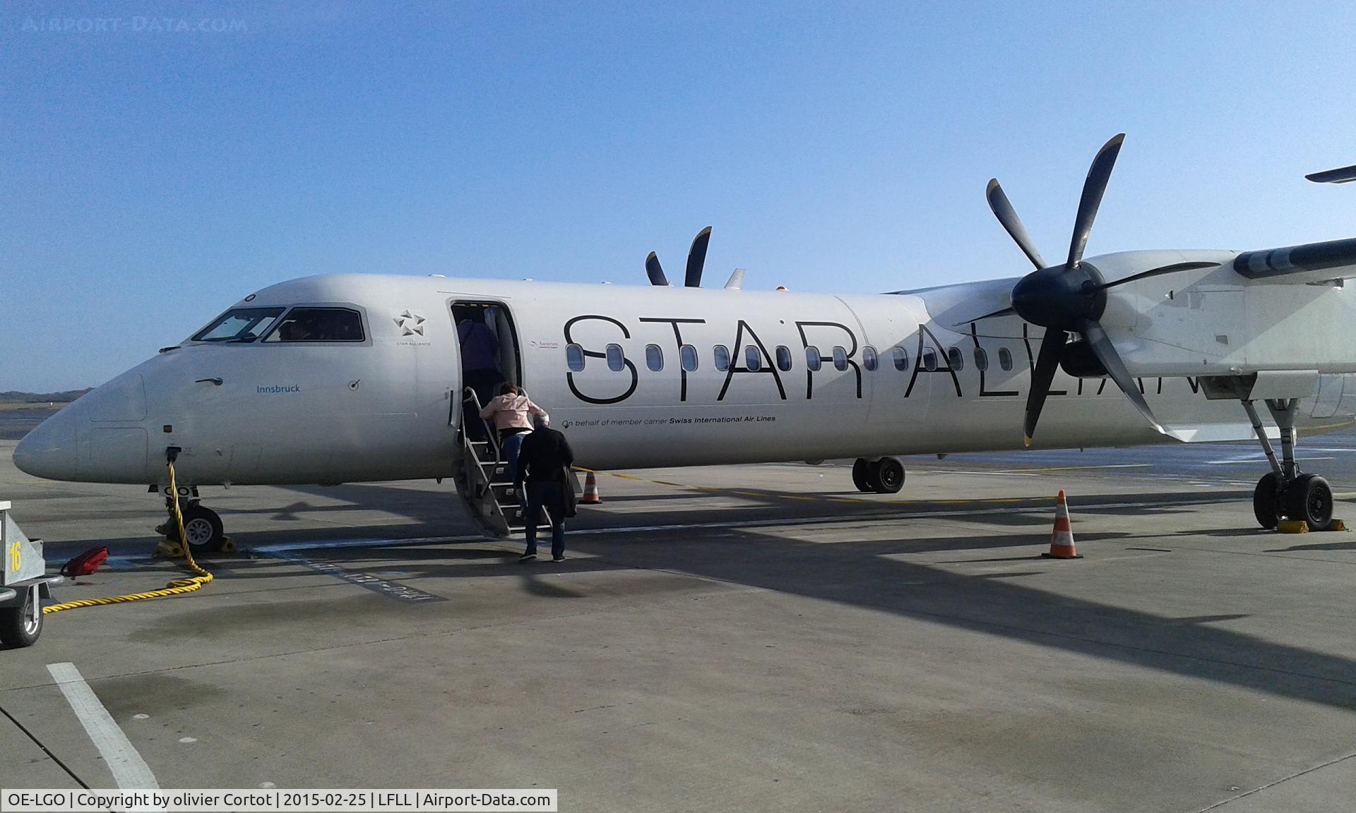 OE-LGO, 2009 De Havilland Canada DHC-8-400Q Dash 8 C/N 4281, boarding the plane, flying from LYS to ZRH