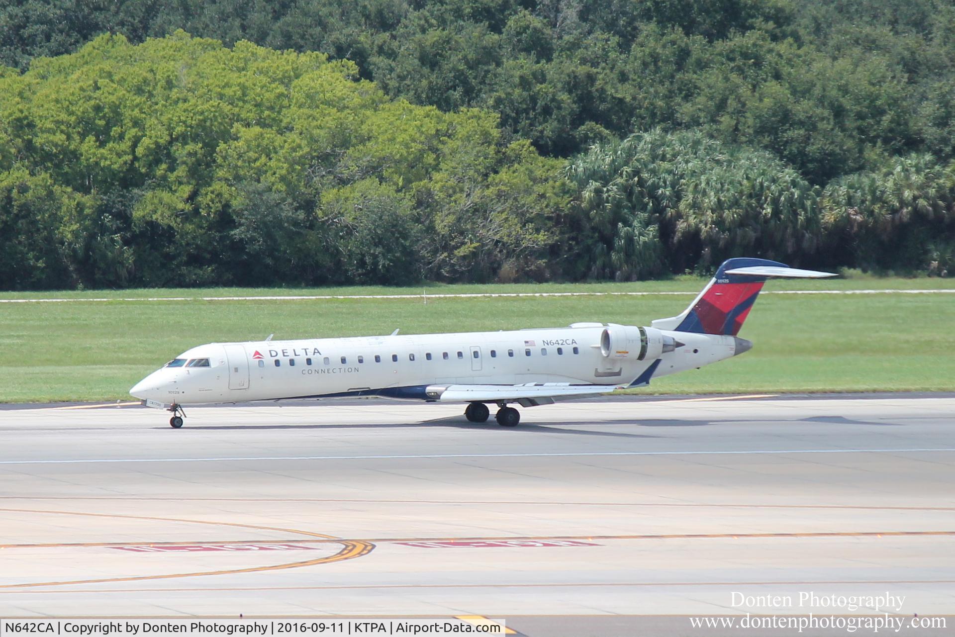 N642CA, 2003 Bombardier CRJ-700 (CL-600-2C10) Regional Jet C/N 10125, Delta Flight 6272 operated by GoJet (N642CA) arrives at Tampa International Airport following flight from Raleigh-Durham International Airport