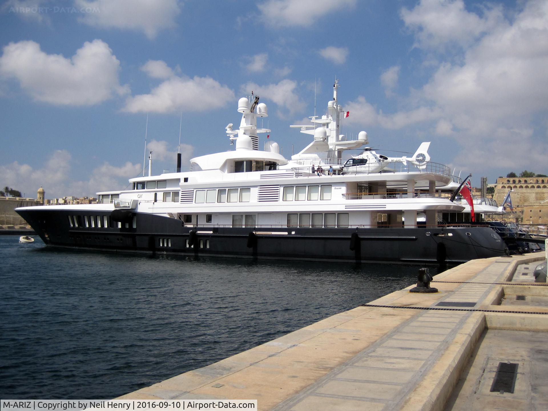 M-ARIZ, Eurocopter EC-135P-2 C/N 0242, Luxury motor yacht in Dockyard Creek, Malta (name is possibly QLF or QLR - you decide from the picture!) with Eurocopter M-ARIZ on stern landing pad.