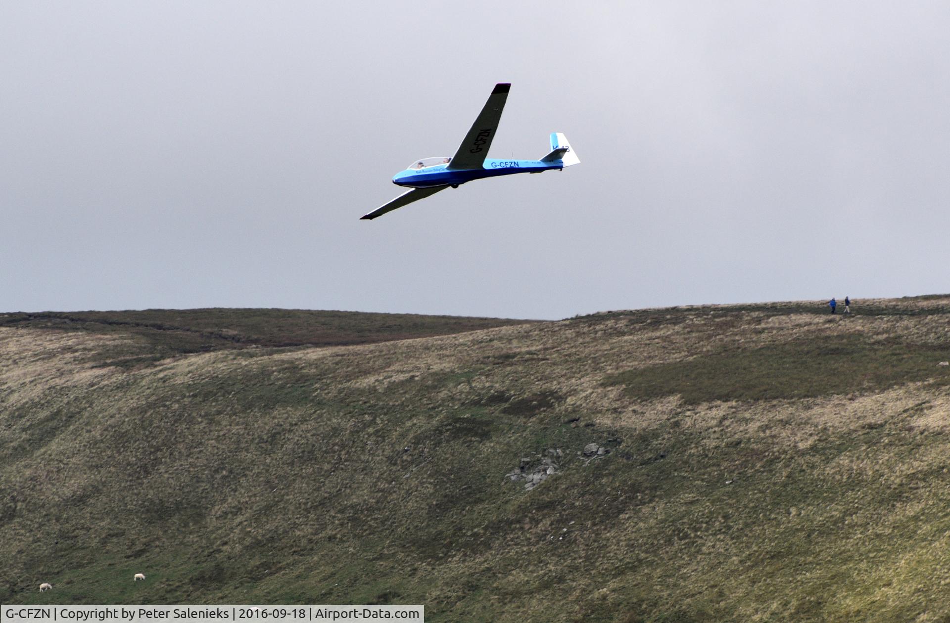 G-CFZN, Schleicher ASK-13 C/N 13045, G-CFZN was seen gliding over the Black Mountains between Y Grib and Waun Fach by members of Gwent Mountaineering Club.