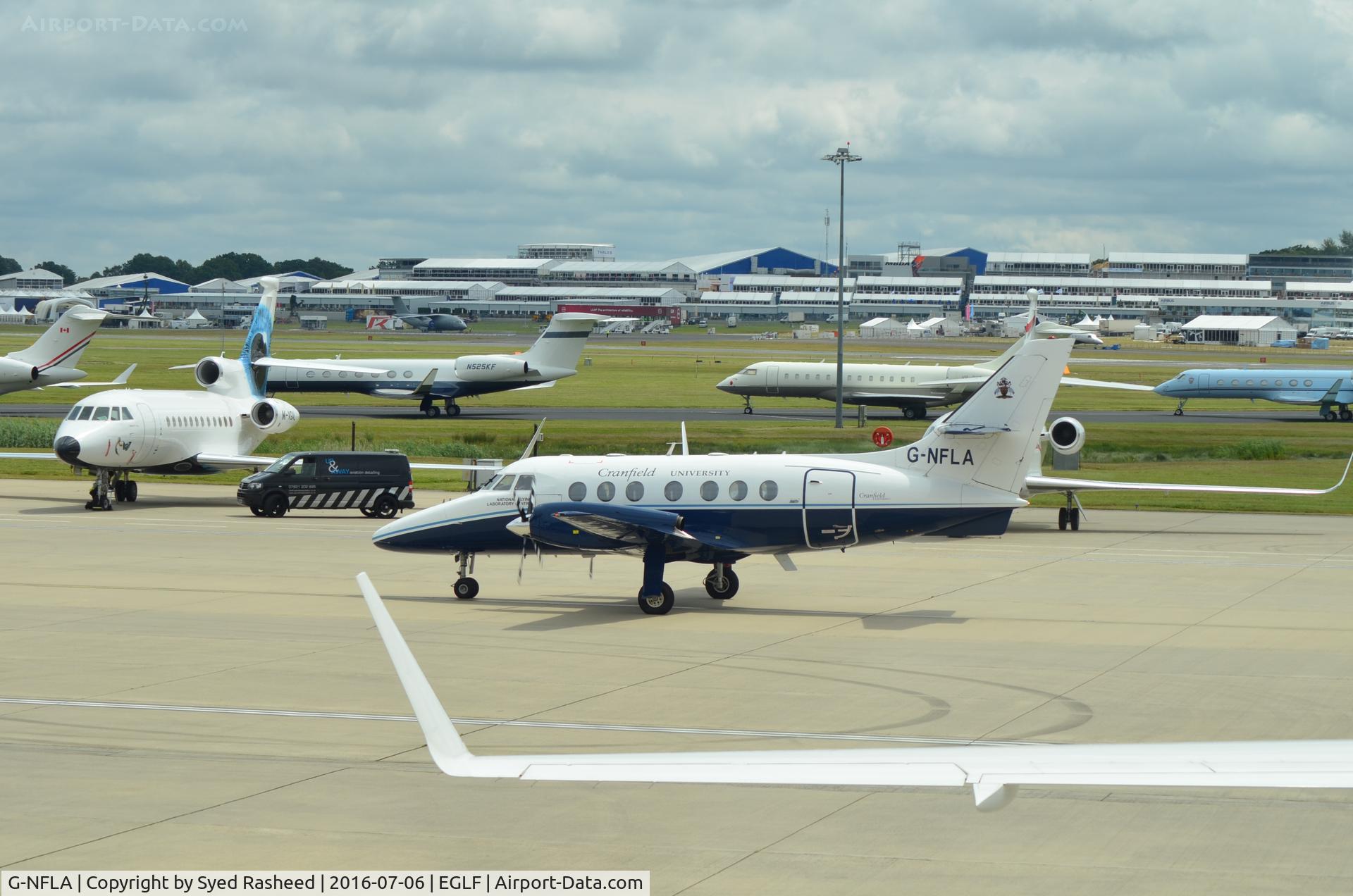 G-NFLA, 1984 British Aerospace BAe-3102 Jetstream 31 C/N 637, G-NFLA taxing past M-VGAL (Virgin Executive Jet)
