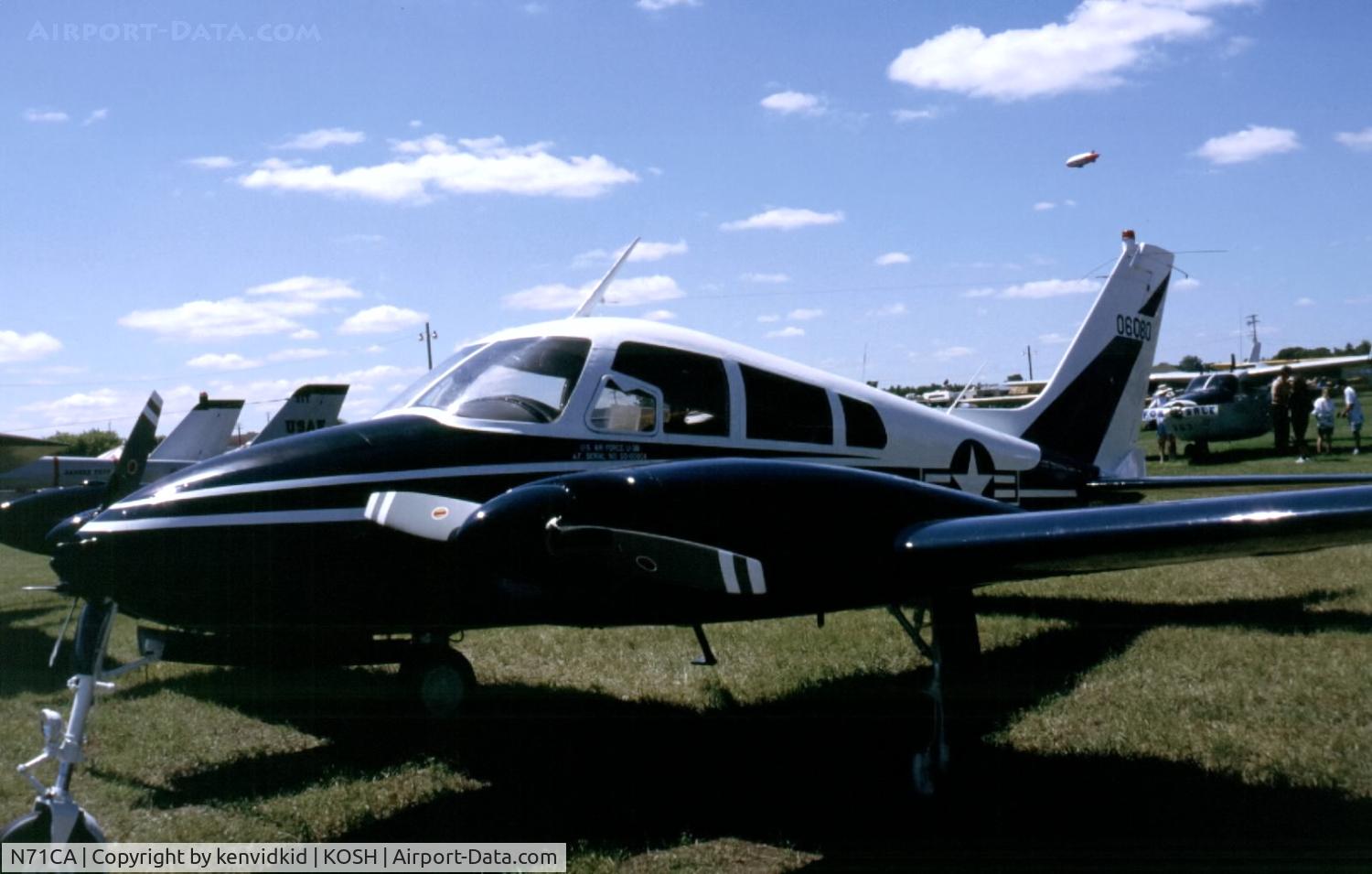 N71CA, Cessna U-3B (310M) C/N 310M-0035, At Air Adventure 1993 Oshkosh.