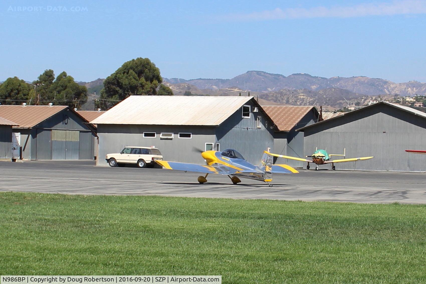 N986BP, 2013 Vans RV-4 C/N 4107, 2013 Stewart VAN's RV-4 'Banana Puddin', Lycoming O-320-D1A 160 Hp, stunning example of an RV-4, landed Rwy 22, taxi off the active