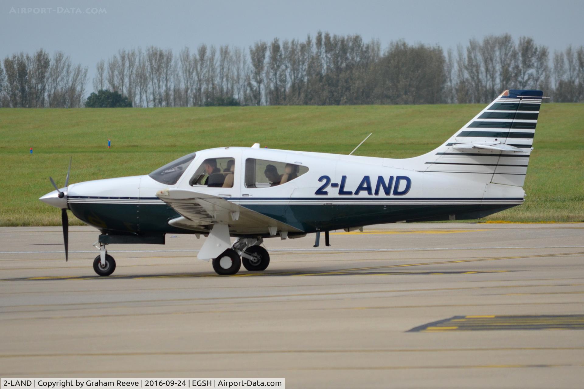 2-LAND, 1999 Rockwell Commander 114B C/N 14662, Parked at Norwich.