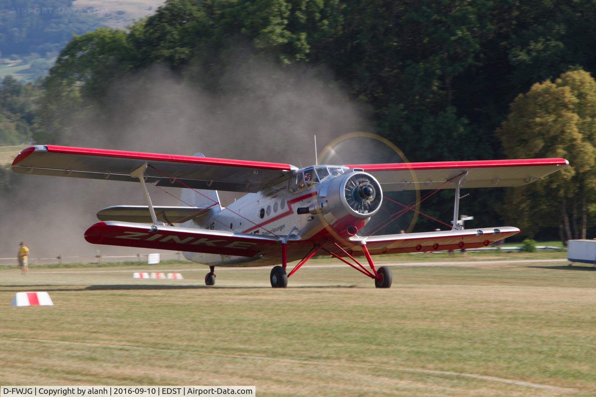 D-FWJG, Pzl-mielec An-2T C/N 1G142-32, Stirring up the dust as it begins take-off run at the 2016 Hahnweide Oldtimer Fliegertreffen