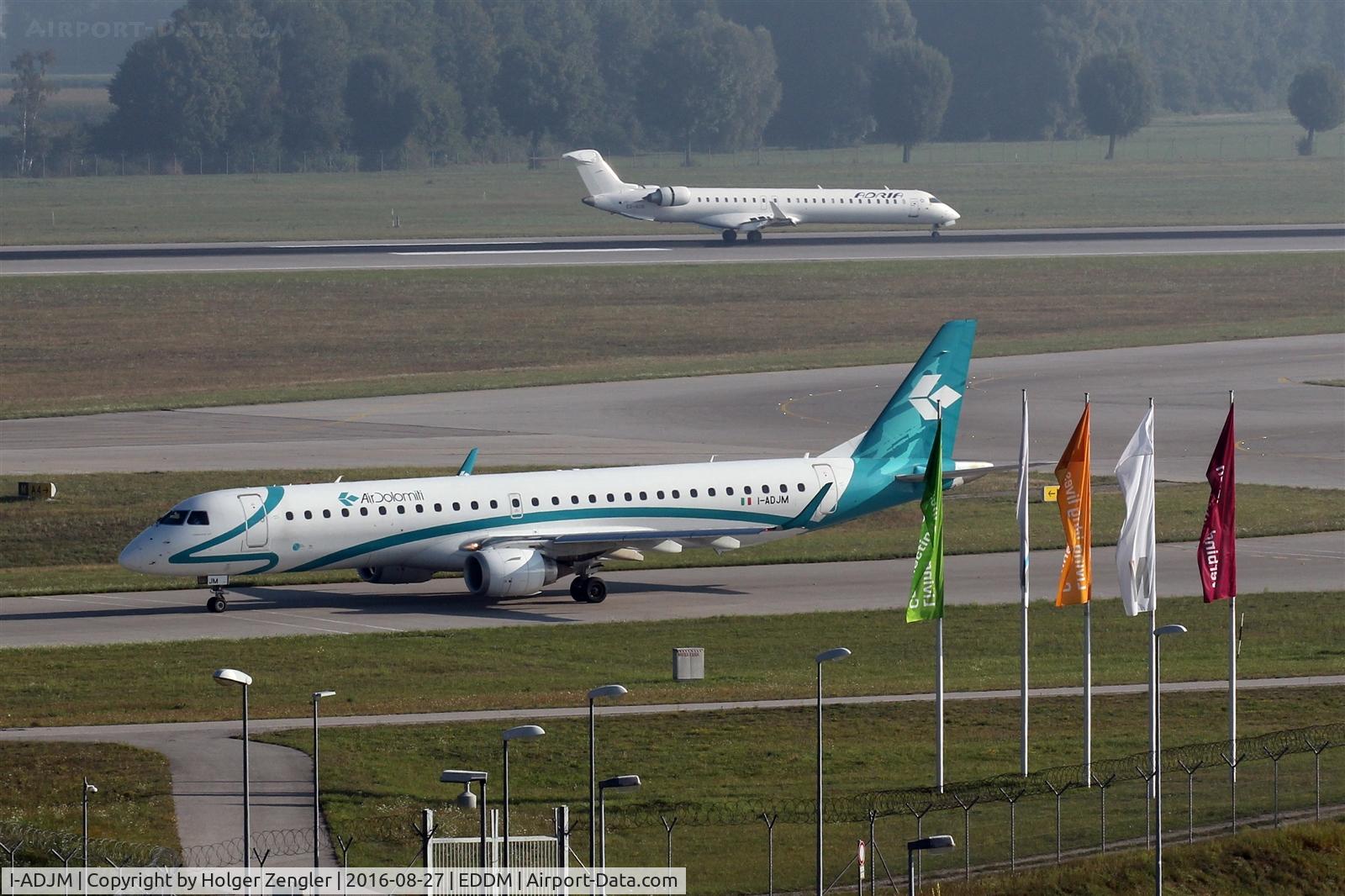 I-ADJM, 2009 Embraer 195LR (ERJ-190-200LR) C/N 19000258, On taxi to departure on rwy 08L...
