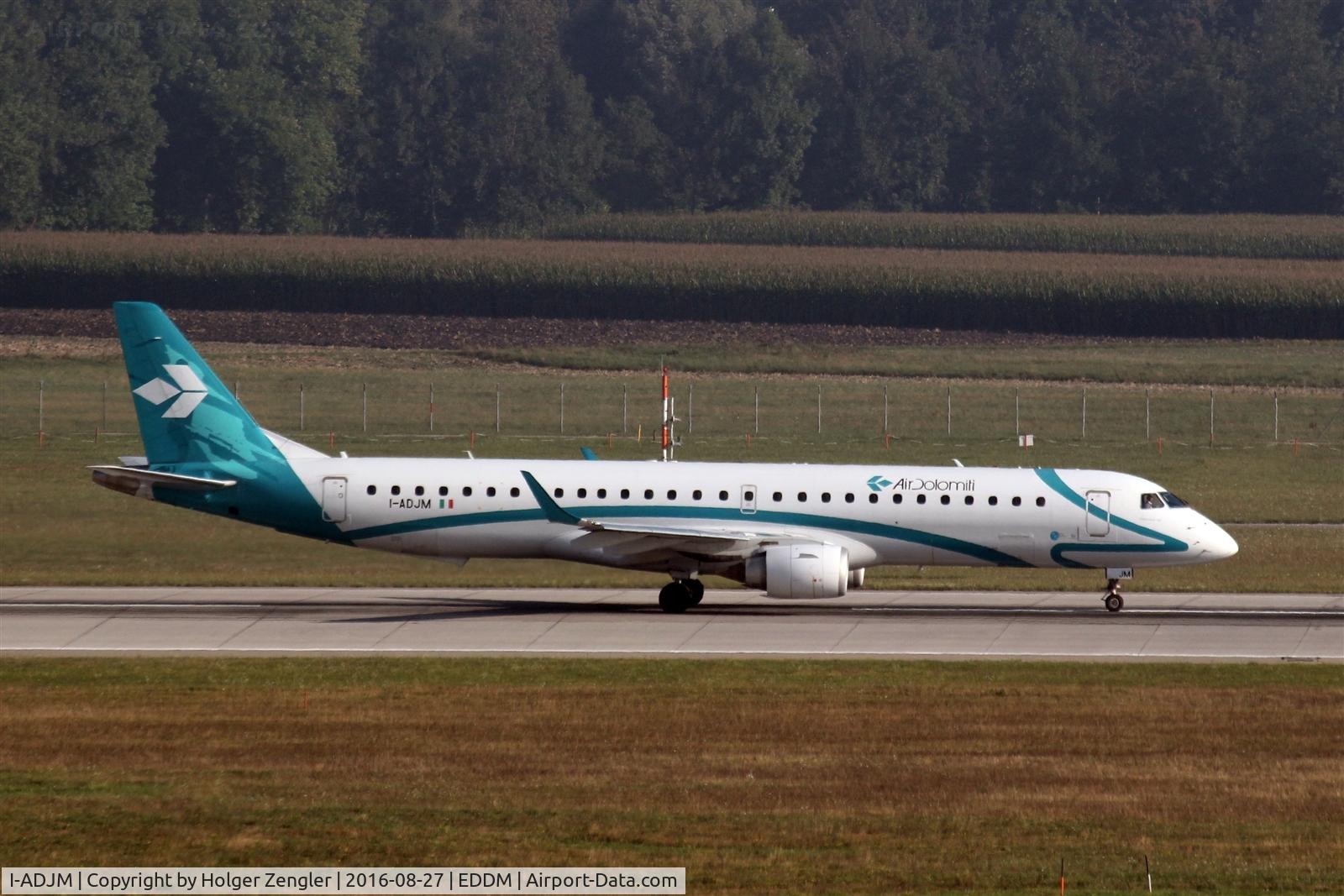 I-ADJM, 2009 Embraer 195LR (ERJ-190-200LR) C/N 19000258, Outbound traffic on rwy 08L....