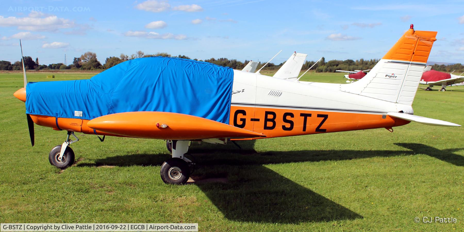 G-BSTZ, 1977 Piper PA-28-140 Cherokee Cruiser C/N 28-7725153, All wrapped up at the City Airport Manchester,  Barton EGCB