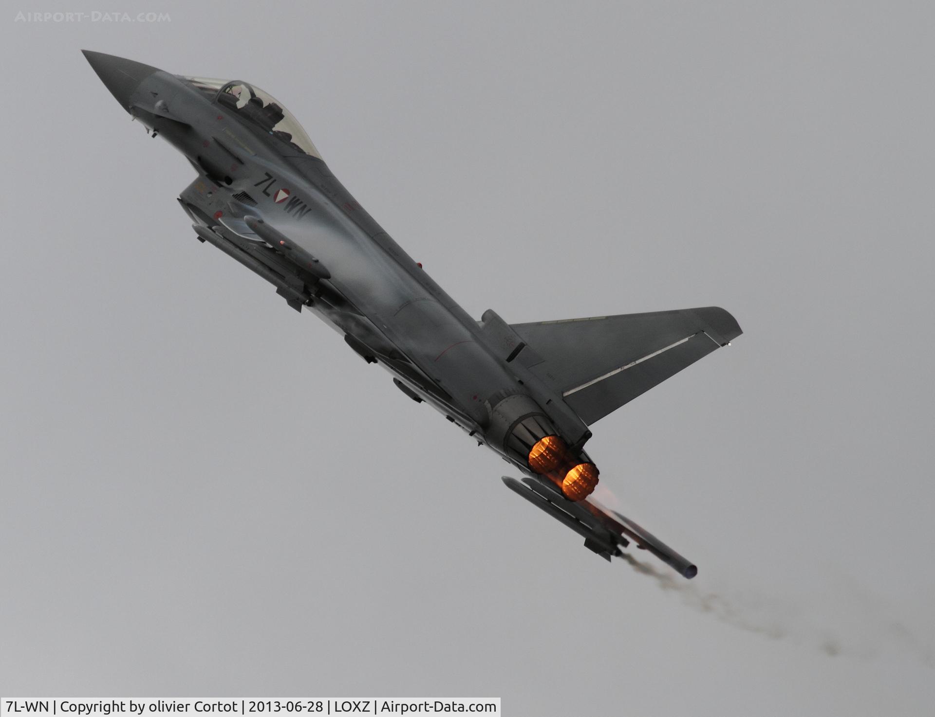 7L-WN, Eurofighter EF-2000 Typhoon S C/N GS011, the good thing with bad weather is that you can see the afterburner better than with sunshine...