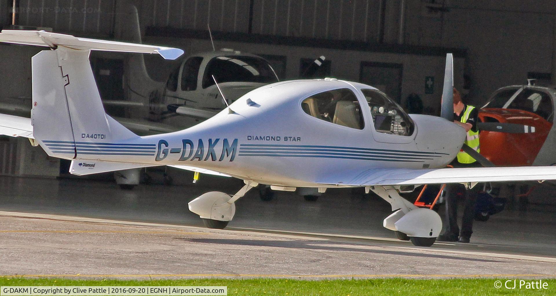 G-DAKM, 2006 Diamond DA-40D Diamond Star C/N D4.222, Being put to bed in Hangar 3 at Blackpool EGNH