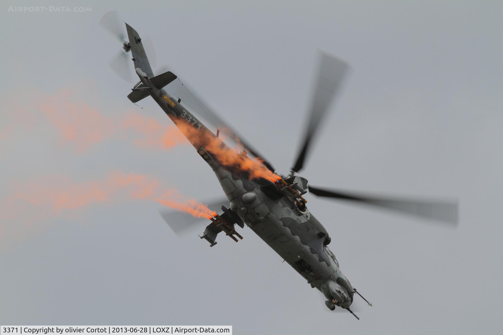 3371, 2006 Mil Mi-35 Hind E C/N 203371, some color in the grey sky, Airpower 13