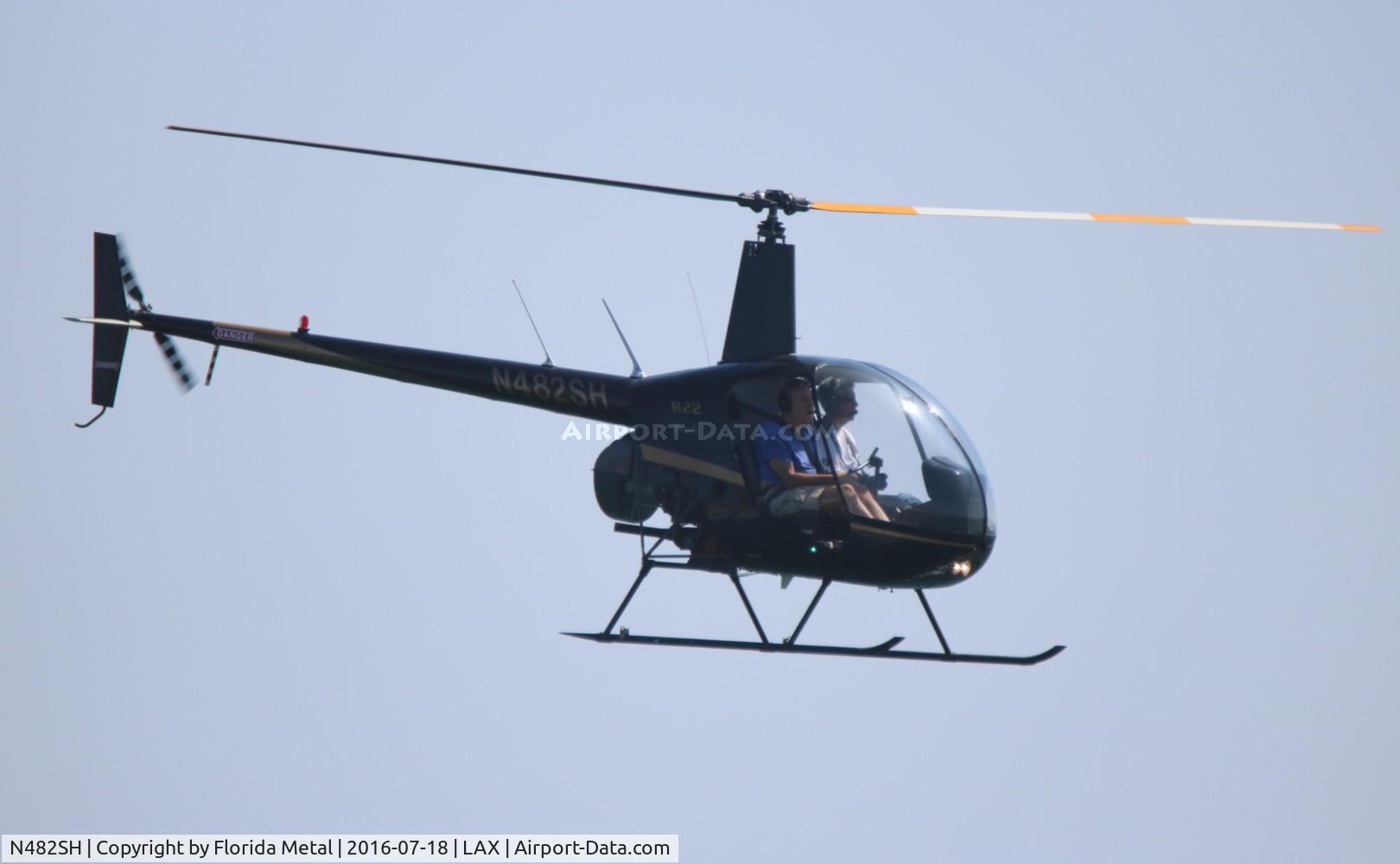N482SH, 2006 Robinson R22 Beta II C/N 4060, R22 lawndart over the Beach at Dockweiler State Park