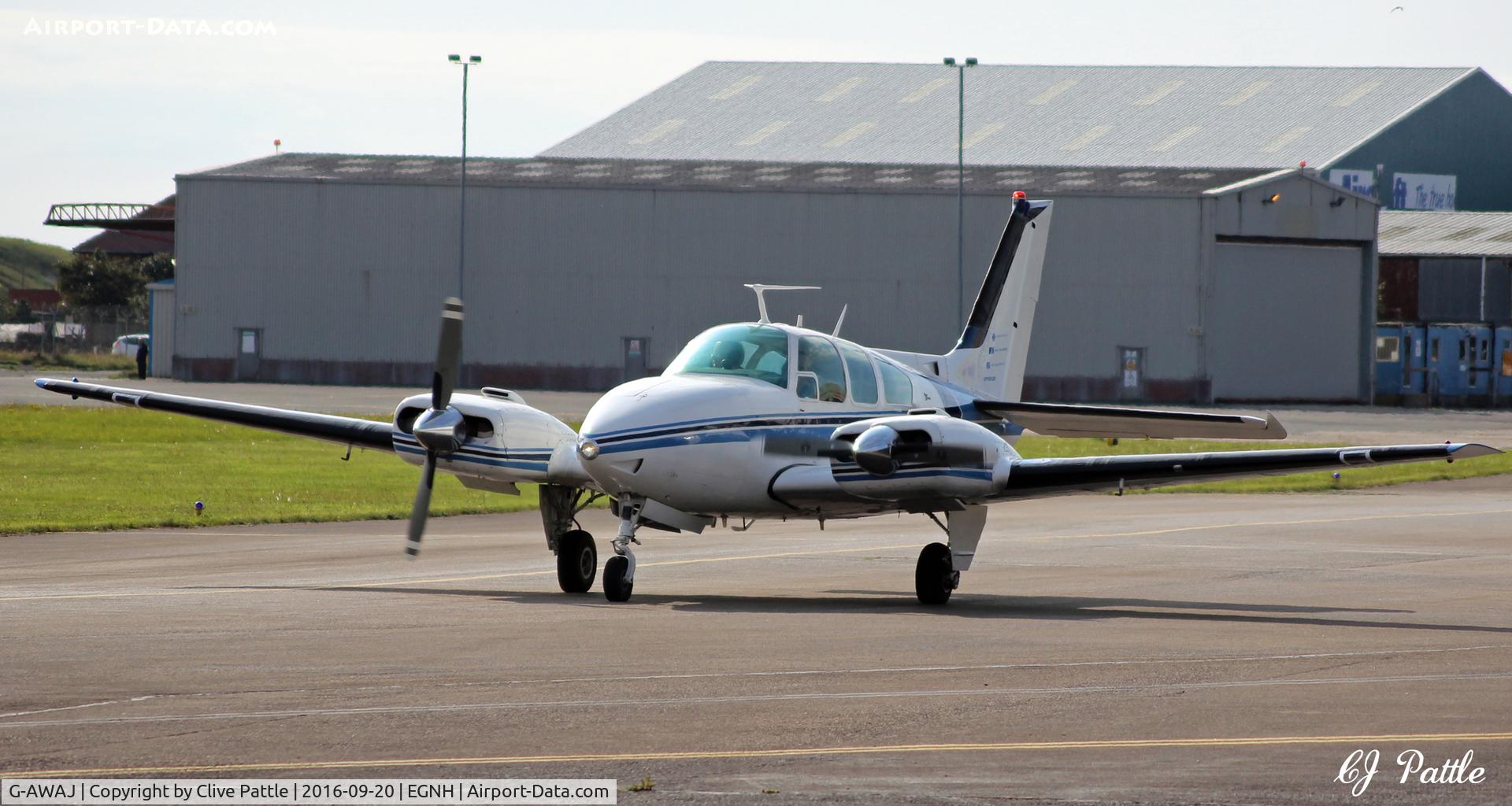 G-AWAJ, 1968 Beech D55 Baron C/N TE-536, At Blackpool EGNH. The photographer first saw this aircraft when it was brand new in 1968 and then based at Hamble EGHM, painted overall red, with the College Of Air Training.
