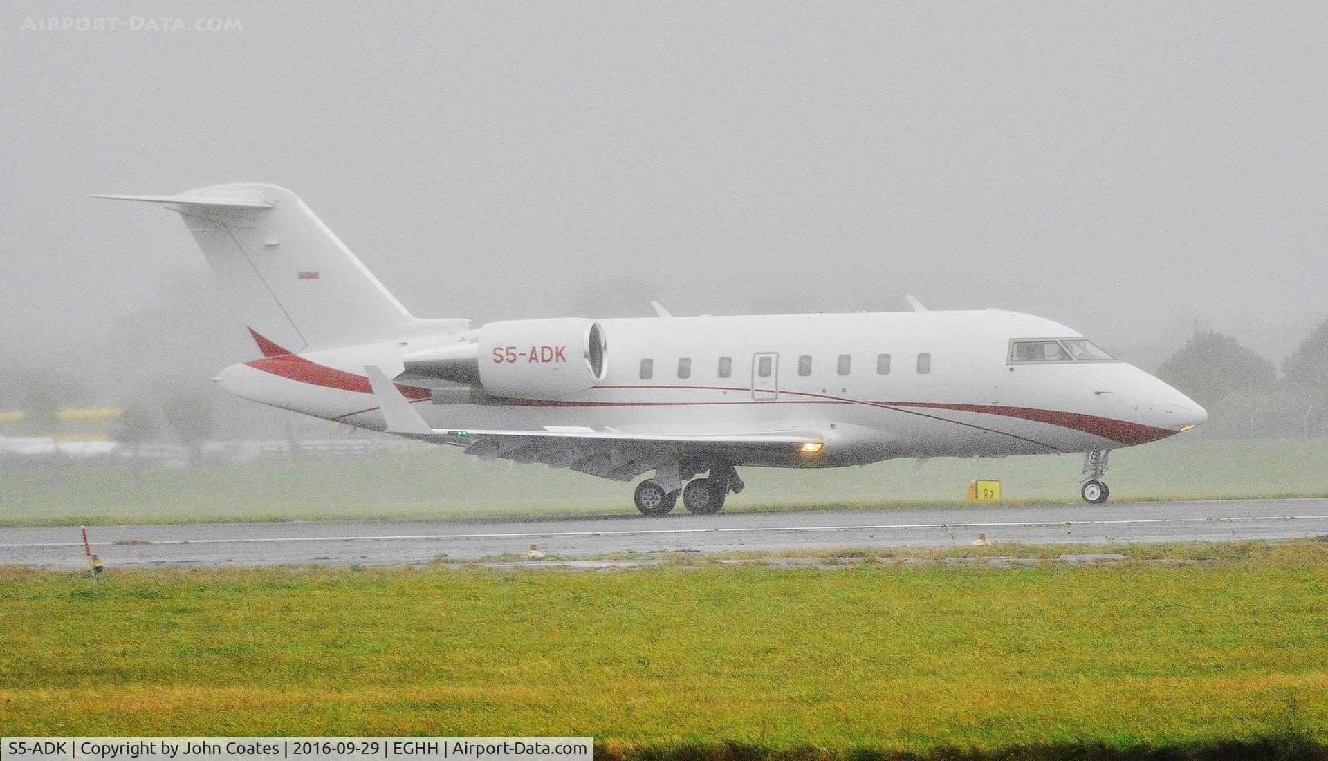 S5-ADK, 2010 Bombardier Challenger 605 (CL-600-2B16) C/N 5855, Early morning arrival through the mist and drizzle