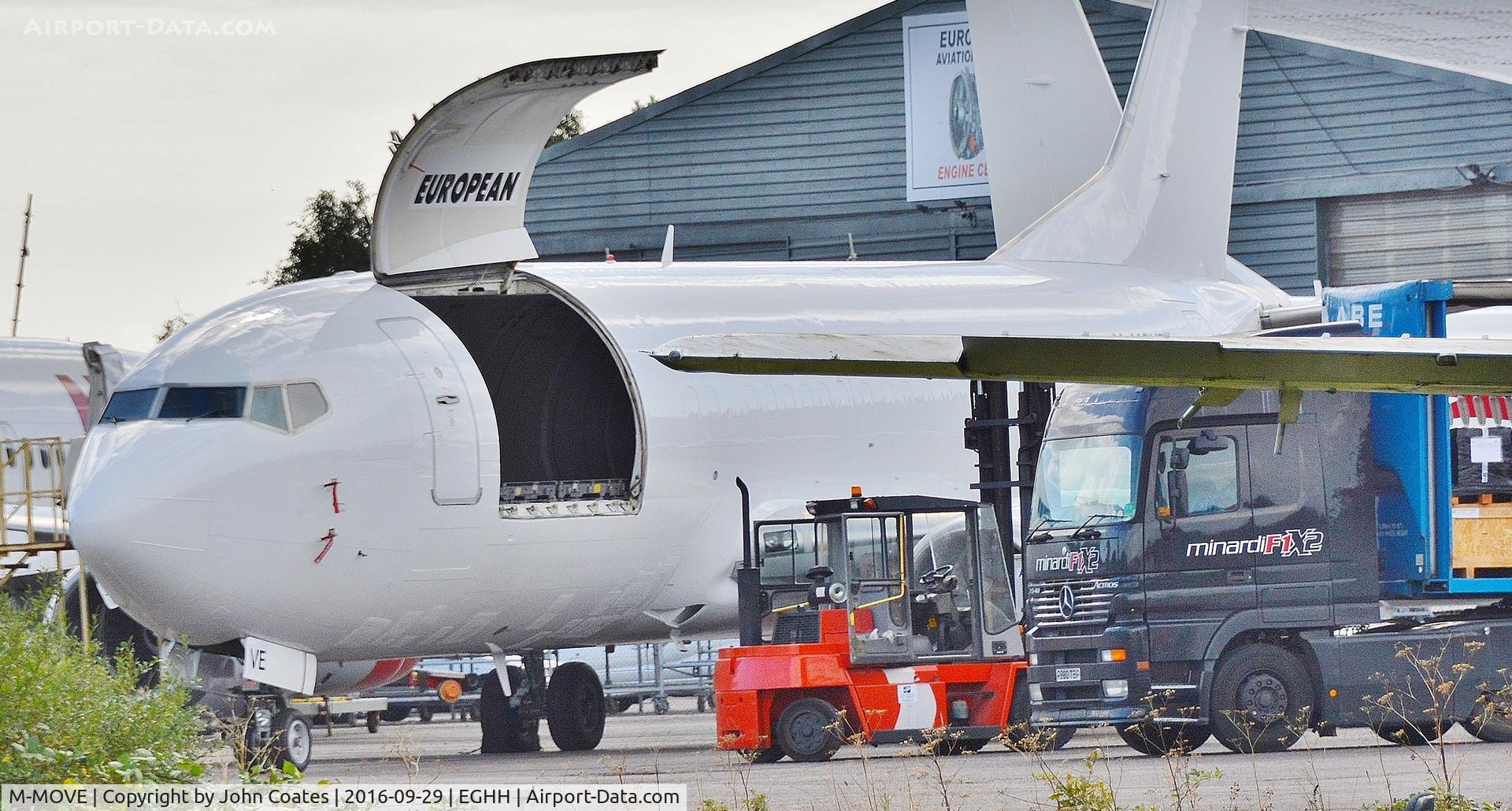 M-MOVE, 1987 Boeing 737-375(SF) C/N 23708, Unloading and showing its new internal titles