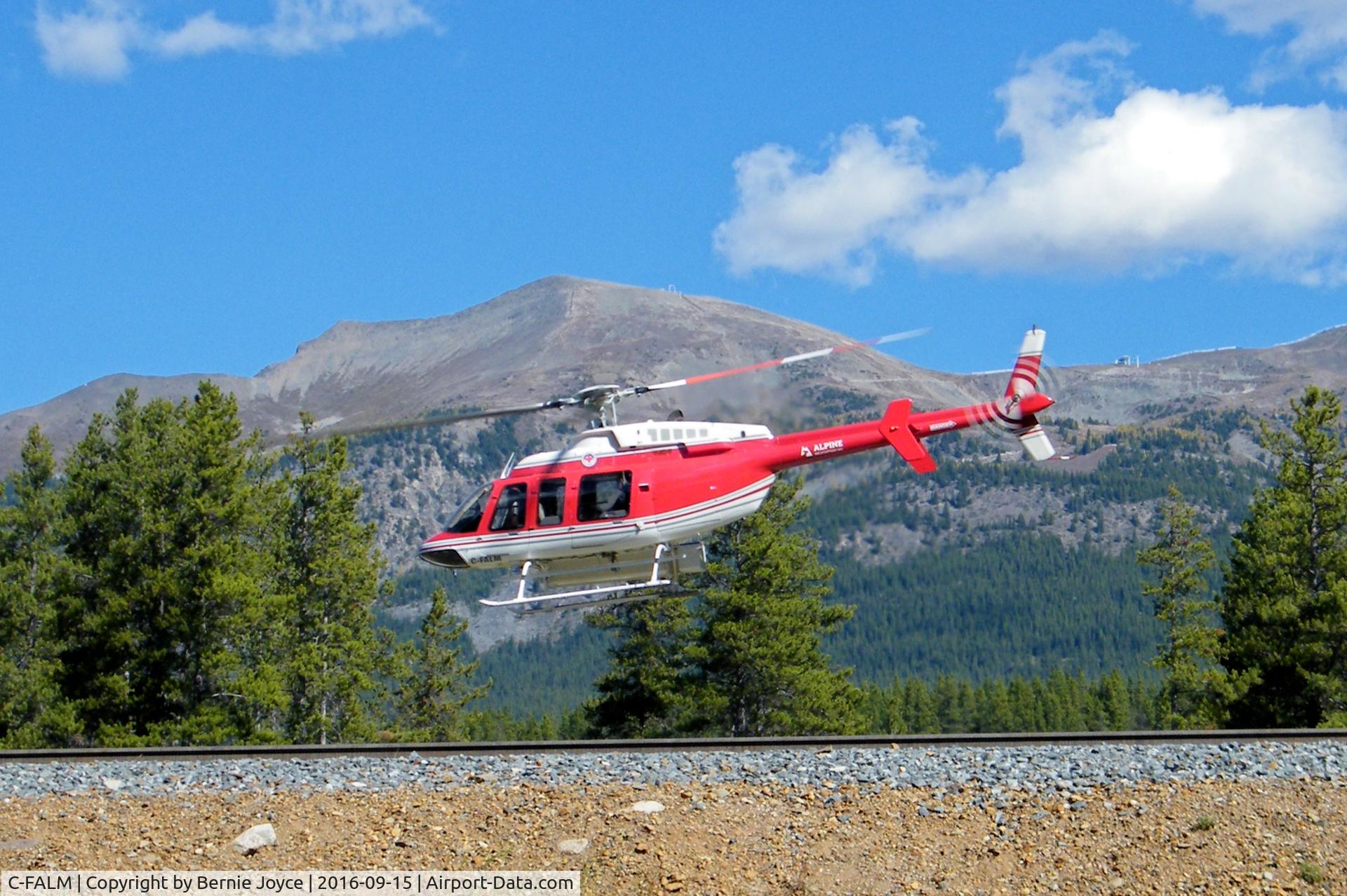 C-FALM, 1996 Bell 407 C/N 53018, Taking off from Lake Louise BC on 15 Sept 2016
