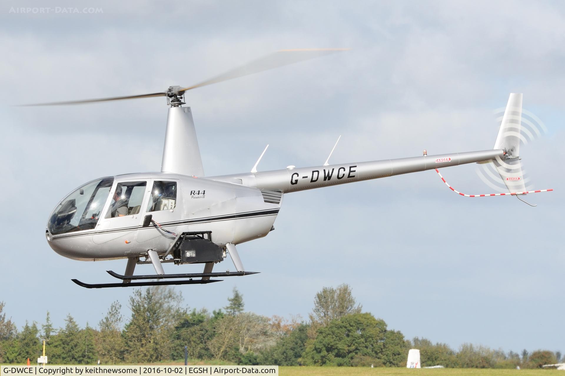 G-DWCE, 2006 Robinson R44 Raven II C/N 11511, Arriving at Norwich.