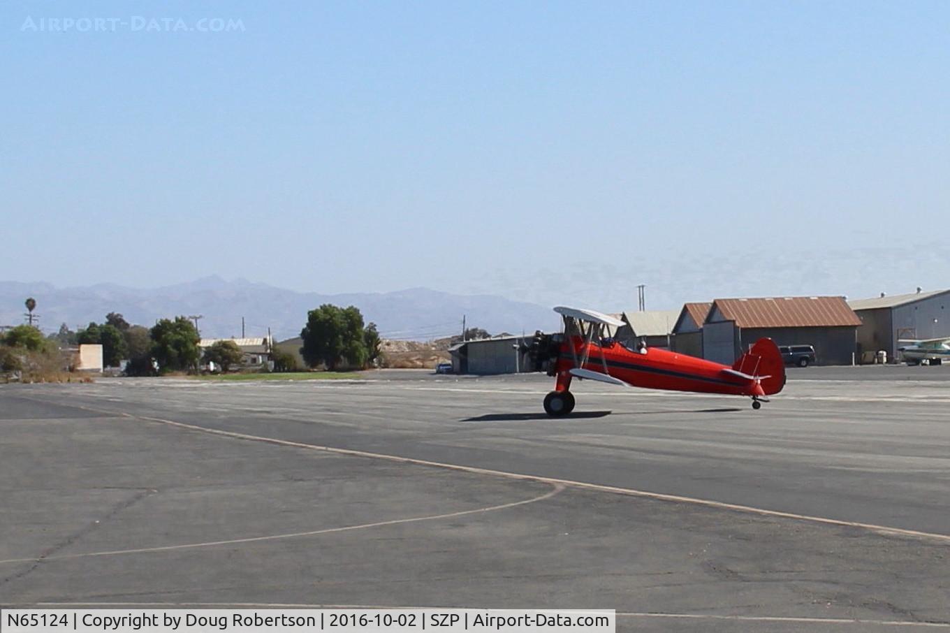 N65124, 1943 Boeing A75N1(PT17) C/N 75-1260, 1943 Boeing Stearman A75N1 (PT-17), 'Spirit of OPEC', P&W R985 450 Hp Wasp Jr. upgrade by Jacobs, featured aircraft-Aviation Museum of Santa Paula First Sunday, taxi off the active