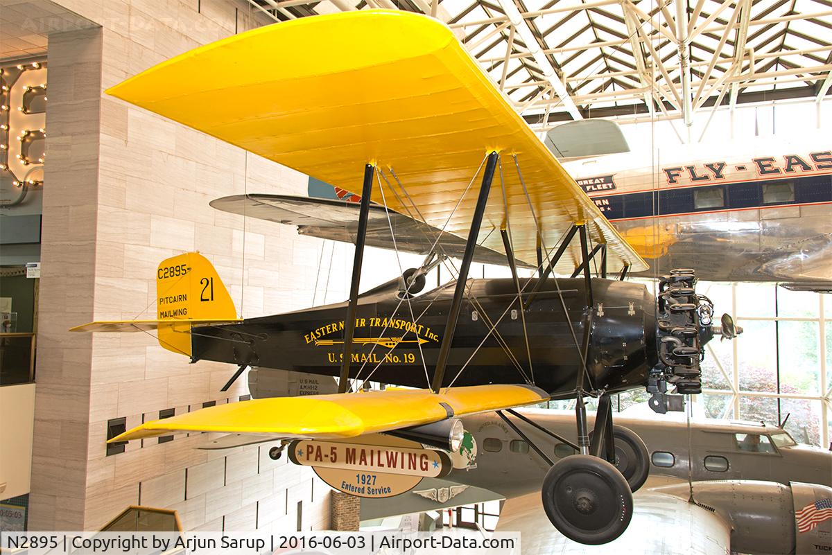 N2895, 1927 Pitcairn PA-5 Mailwing C/N 1, On display at the America by Air exhibition at the National Air and Space Museum. Built in 1927, this PA-5 carried airmail along the eastern United States. The service would lead to the formation of Eastern Air Lines.