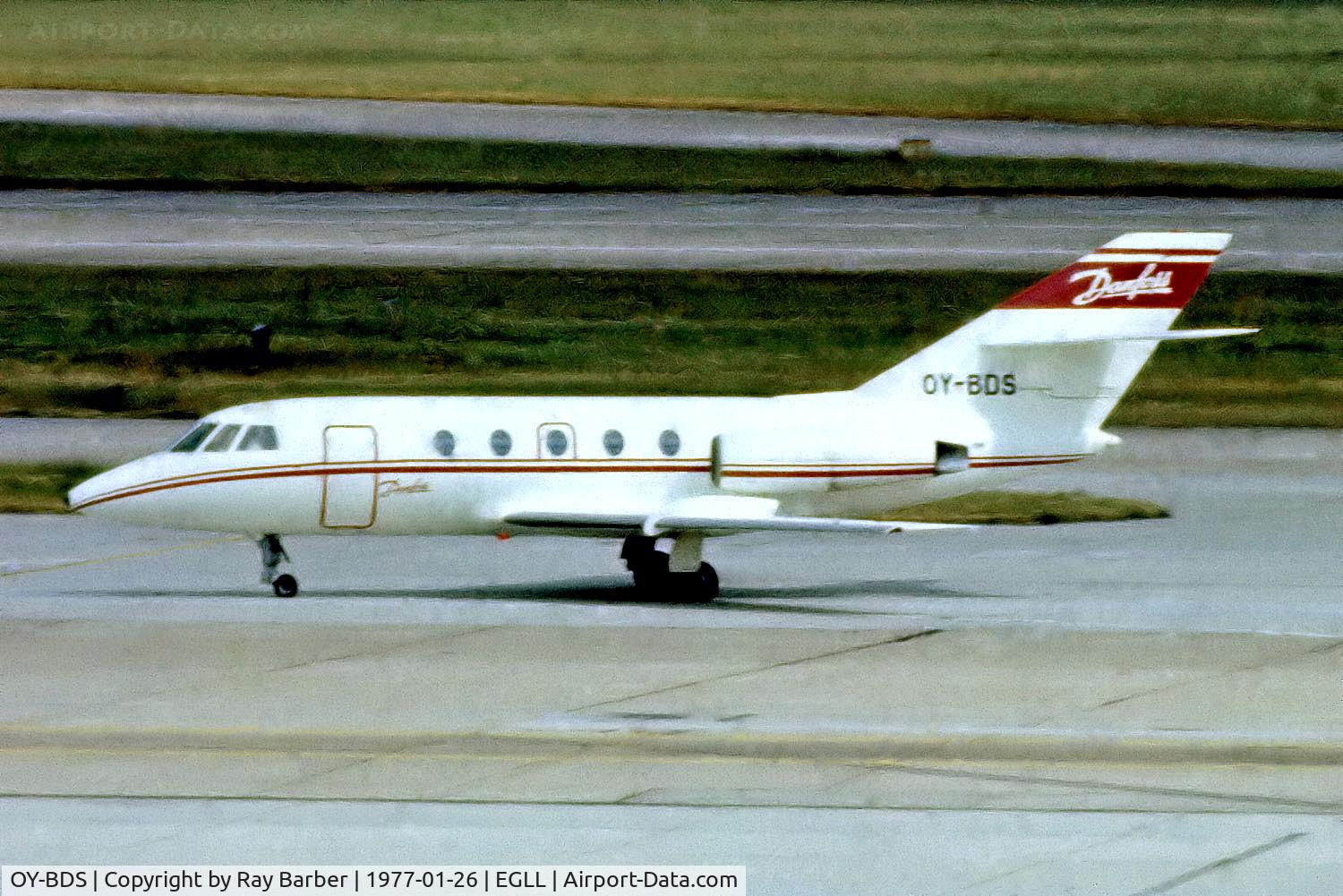 OY-BDS, 1970 Dassault Falcon 20 C/N 180/460, Dassault Falcon 20C [180] (Danfoss Aviation) Heathrow~G @ 26/01/1977. From a slide not the best of shots.