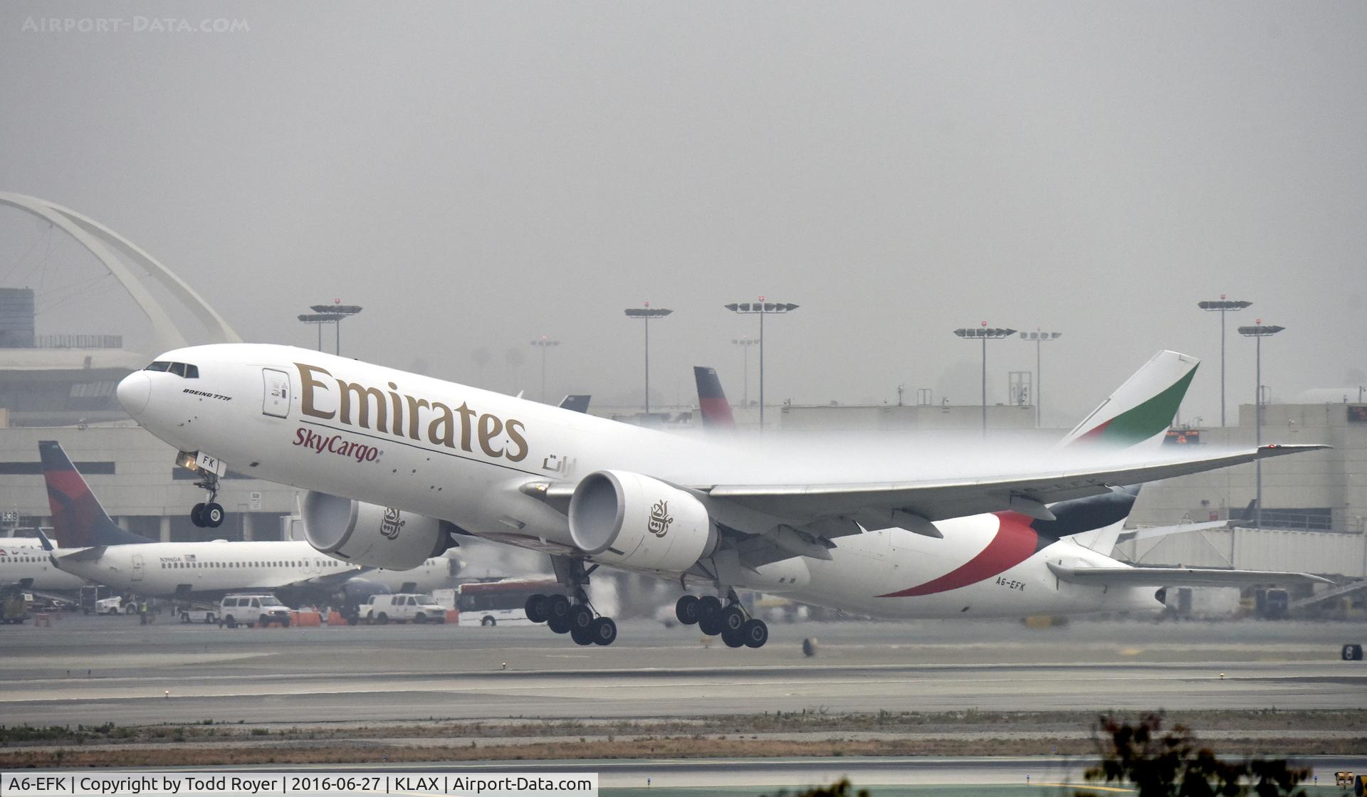 A6-EFK, 2013 Boeing 777-F1H C/N 35611, Departing LAX