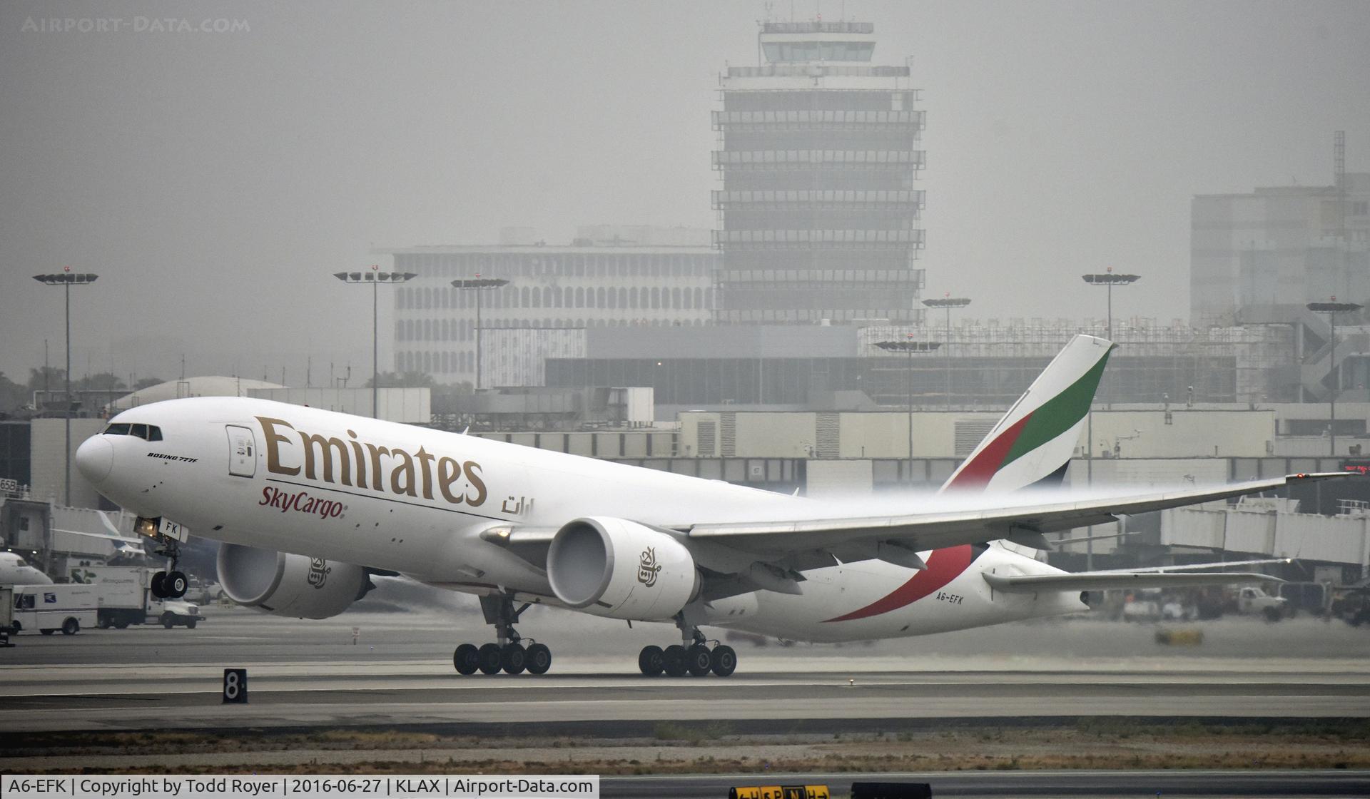 A6-EFK, 2013 Boeing 777-F1H C/N 35611, Departing LAX