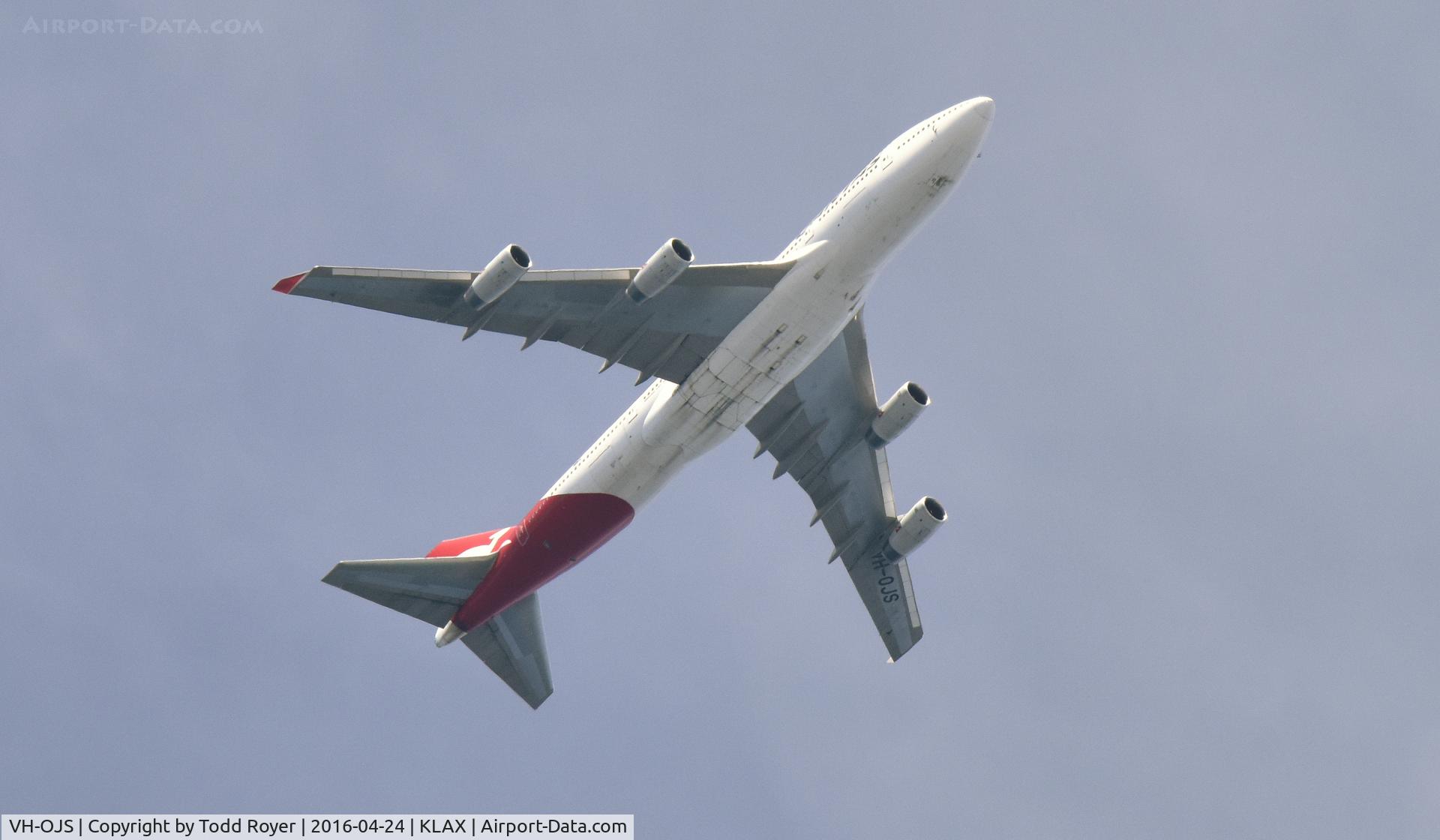 VH-OJS, 1999 Boeing 747-438 C/N 25564, Flying over LAX heading to New York