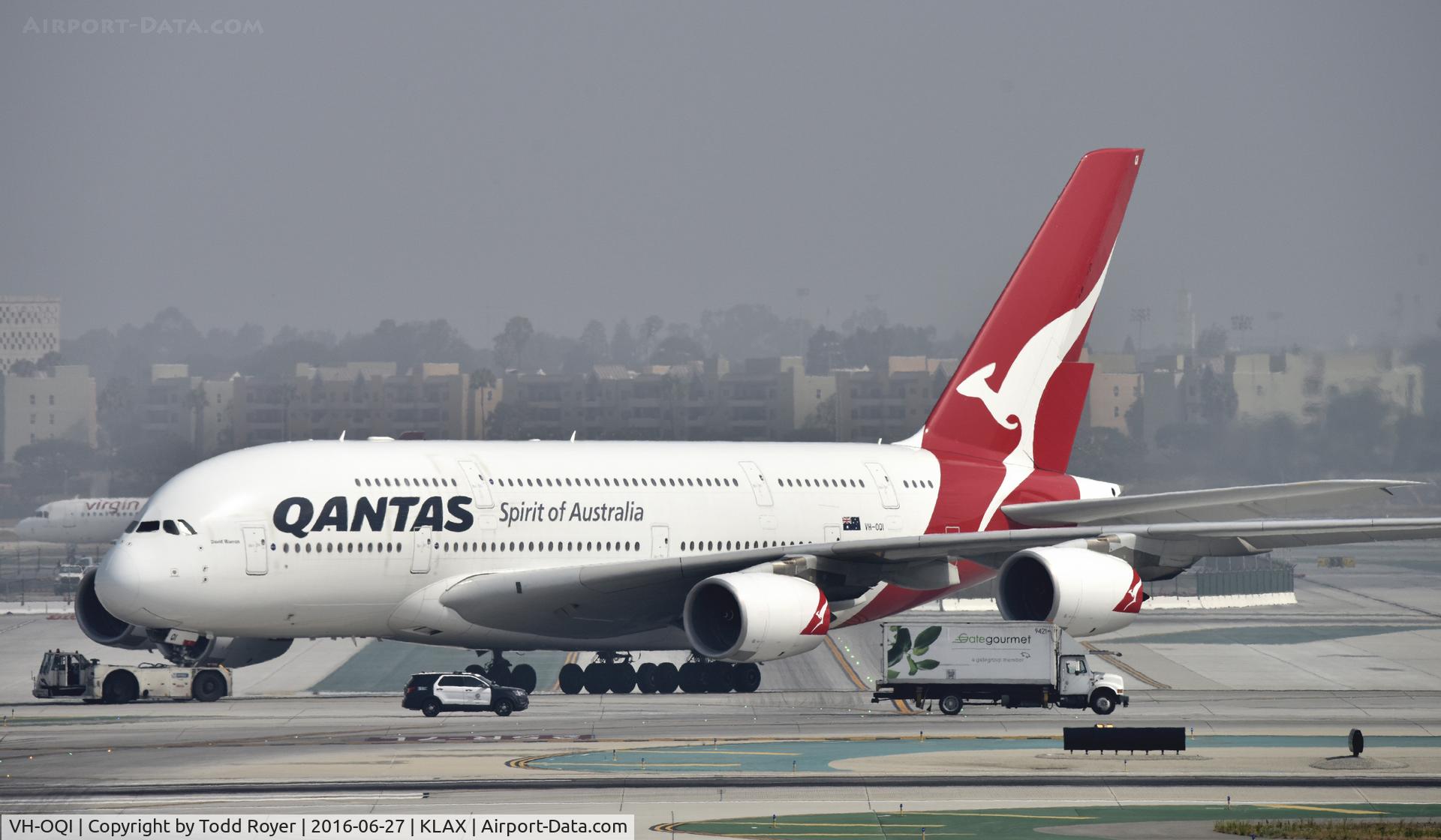 VH-OQI, 2010 Airbus A380-842 C/N 055, Getting towed to parking at LAX