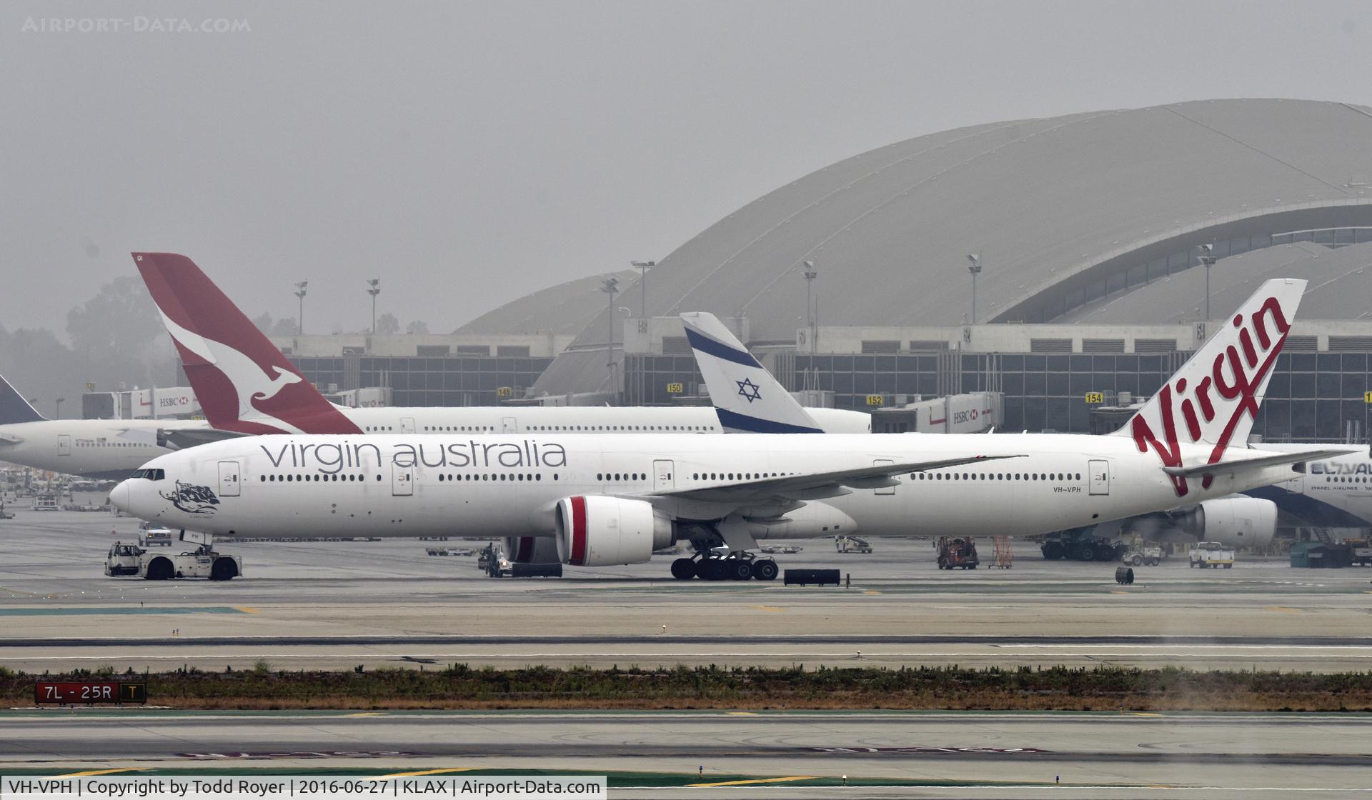 VH-VPH, 2010 Boeing 777-3ZG/ER C/N 37943, Getting towed to parking at LAX