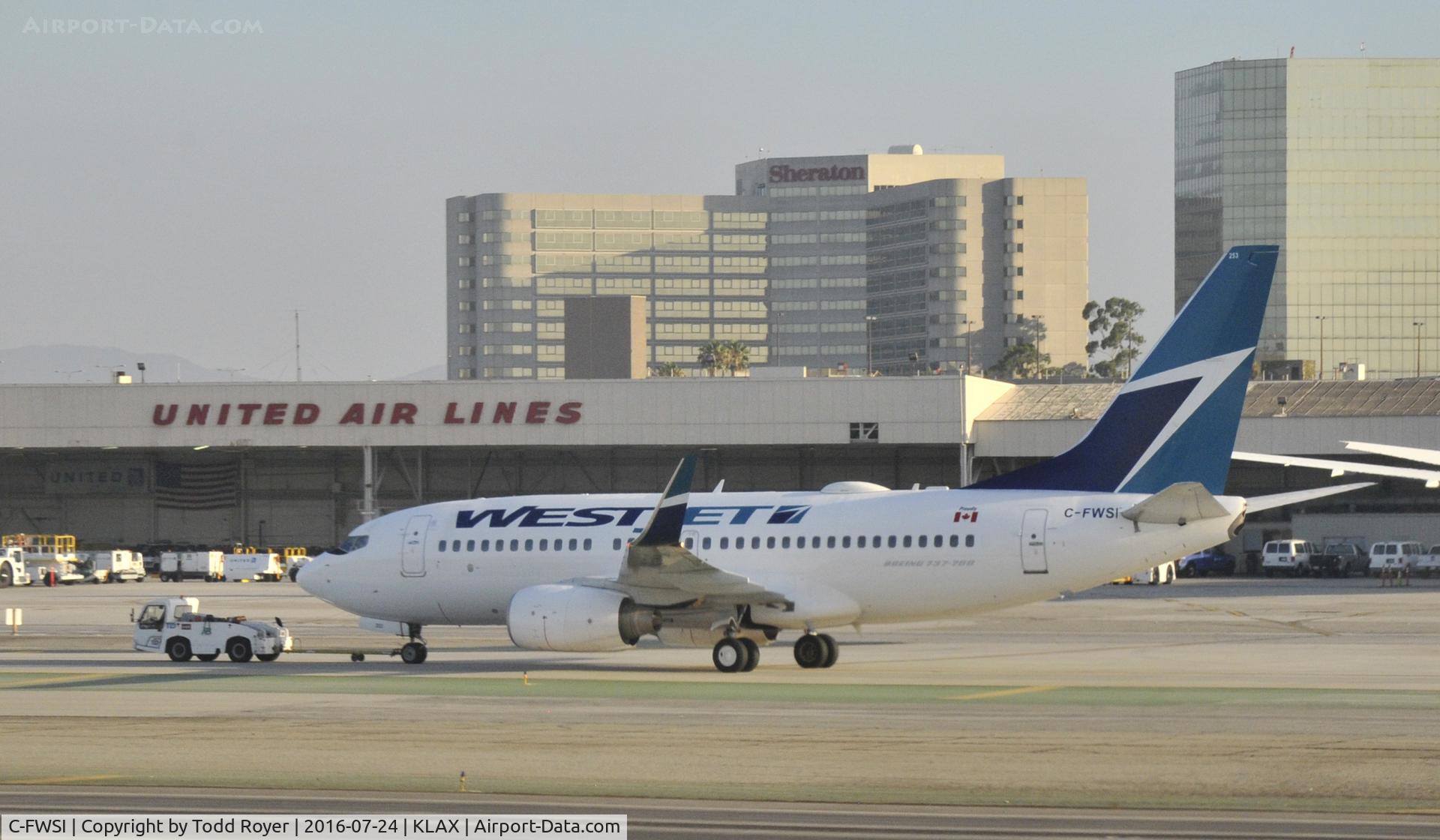 C-FWSI, 2009 Boeing 737-7CT C/N 36691, Getting towed at LAX