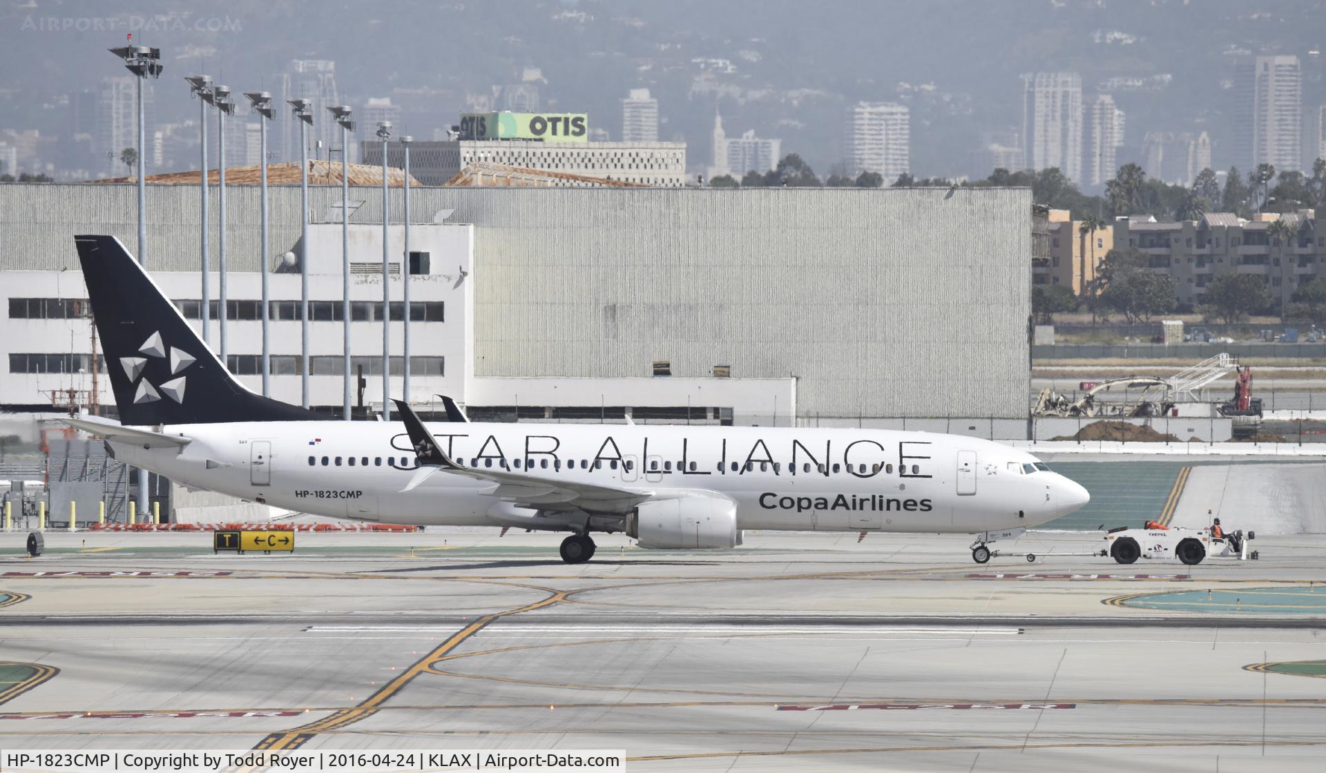 HP-1823CMP, 2012 Boeing 737-86N C/N 39398, Getting towed at LAX