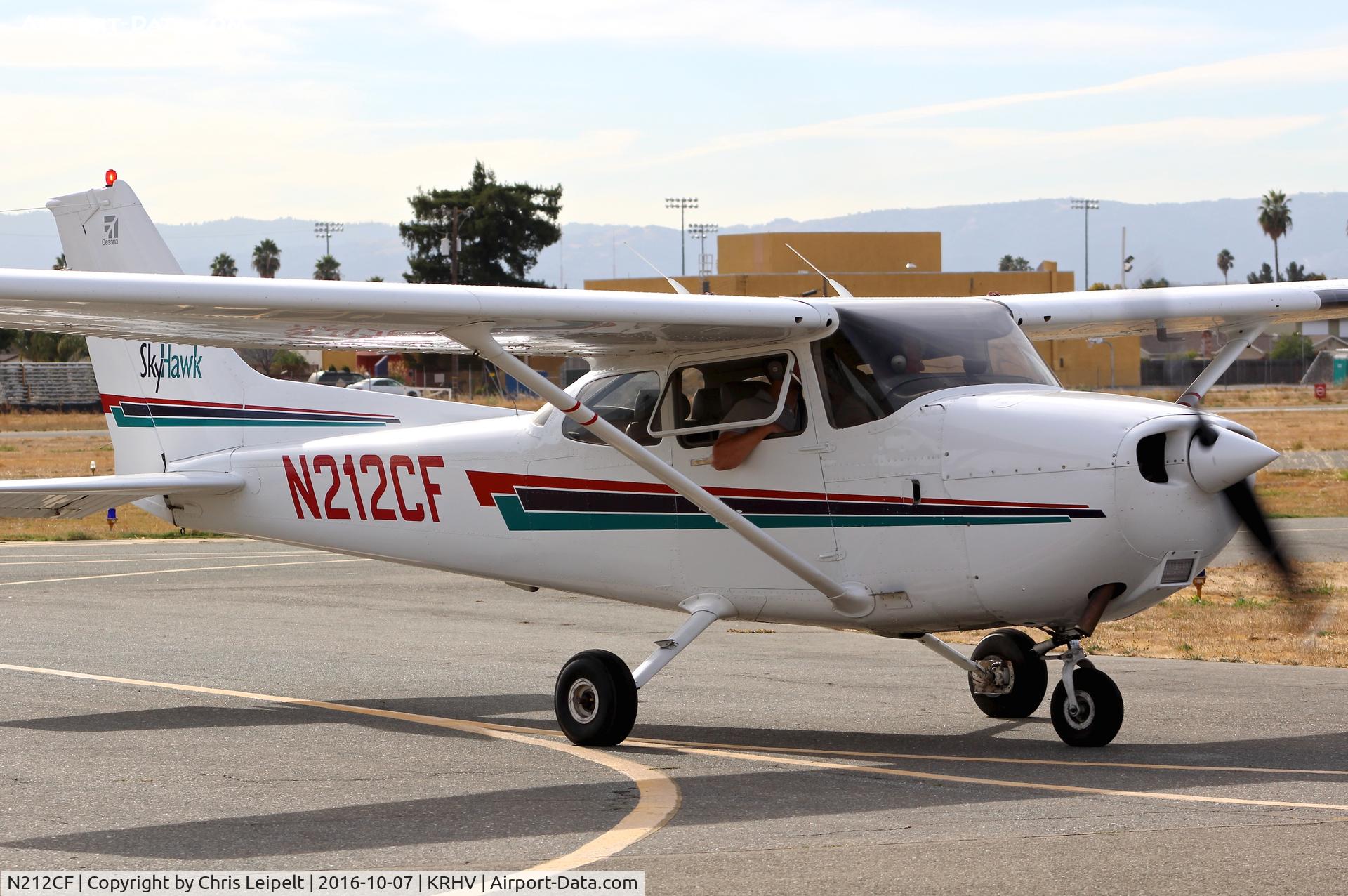 N212CF, 1998 Cessna 172R C/N 17280418, Rucker Aviation Logistics Inc (Shingle Springs, CA) 1998 Cessna 172R taxing to transient before departure an hour later to KMHR at Reid Hillview Airport, San Jose, CA.