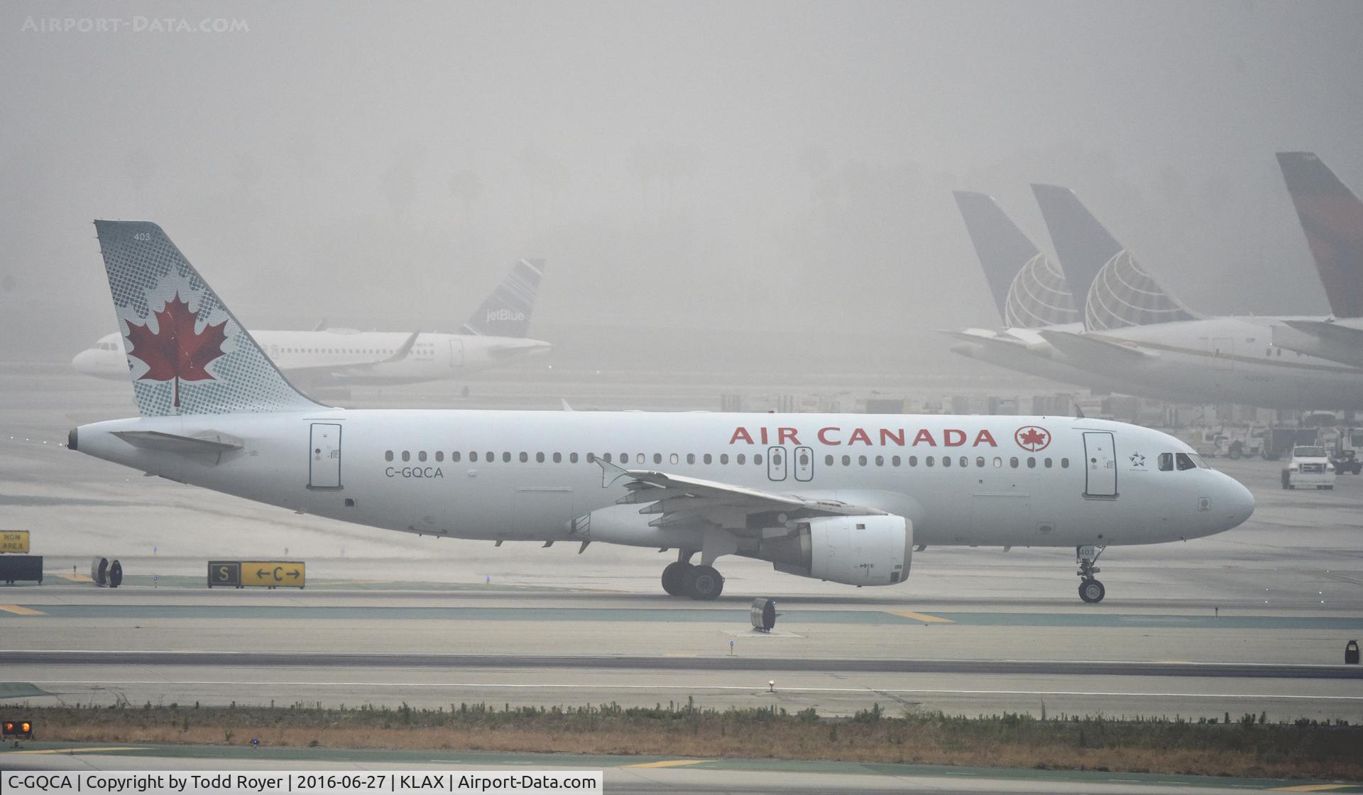 C-GQCA, 1991 Airbus A320-211 C/N 210, Taxiing at LAX on a foggy morning