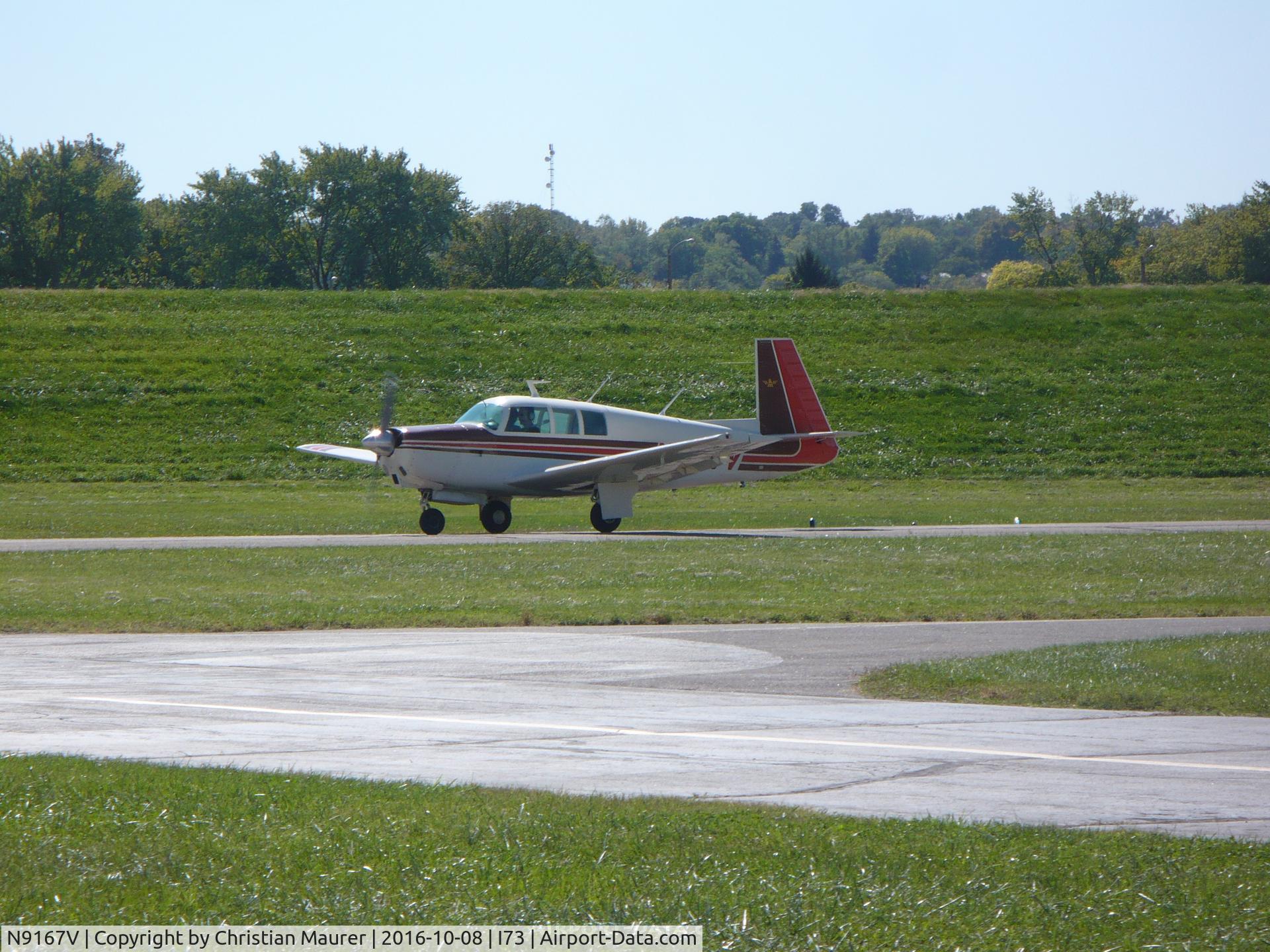 N9167V, 1969 Mooney M-20G Statesman C/N 690015, Mooney taking off