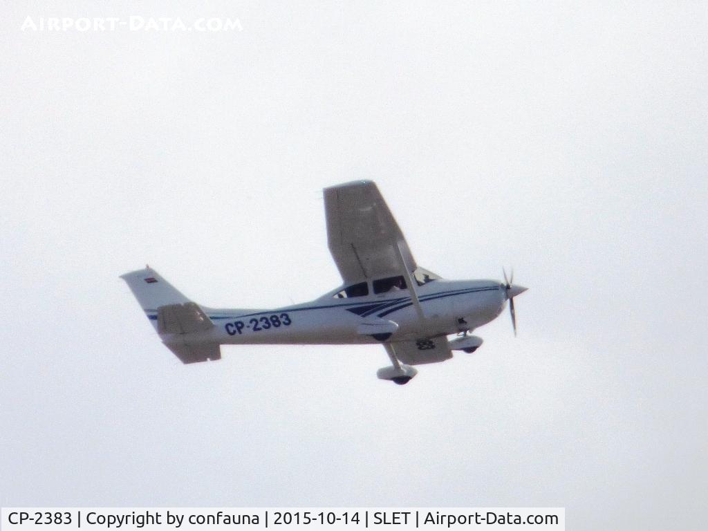 CP-2383, Cessna 182S Skylane C/N 182-80401, Over Santa Cruz city, with bad light